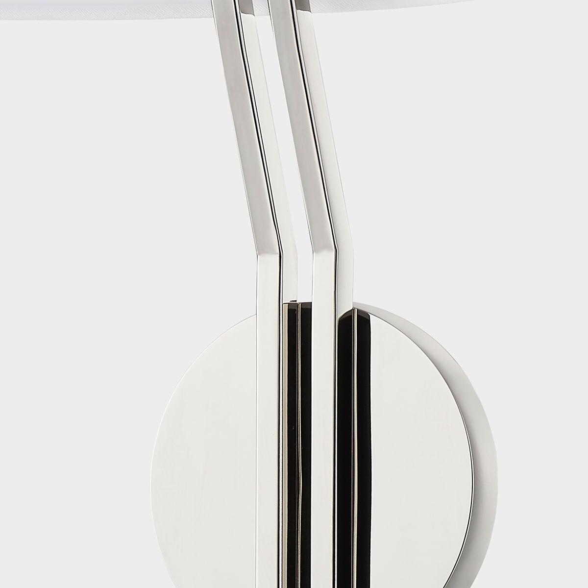 Close-up of the Shokan Wall Sconce in polished nickel showing the arm curve and shade silhouette.