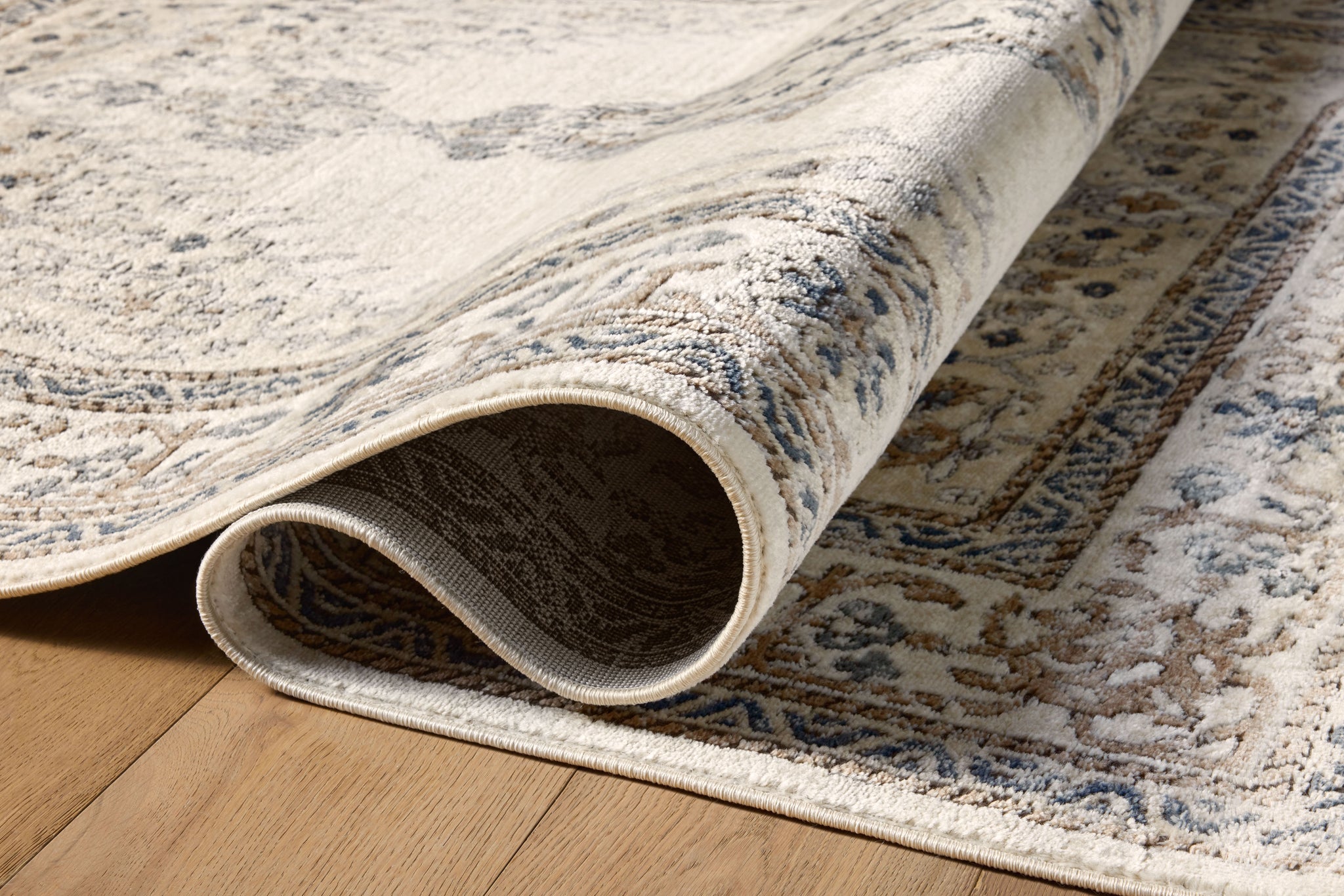 Teagan Oatmeal / Ivory shown from a different angle to reveal its pattern.