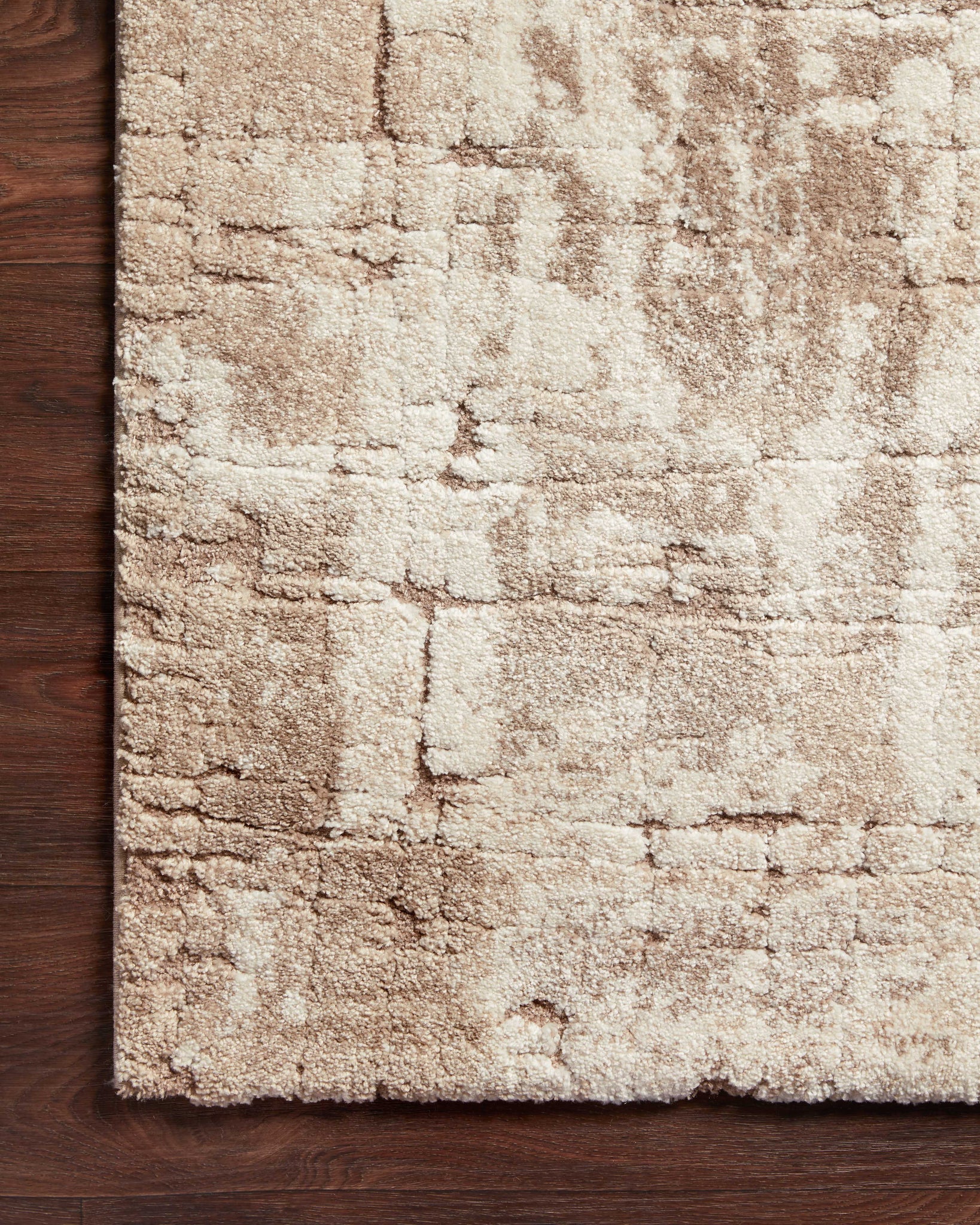 Theory Beige / Taupe shown from a different angle to reveal its pattern.