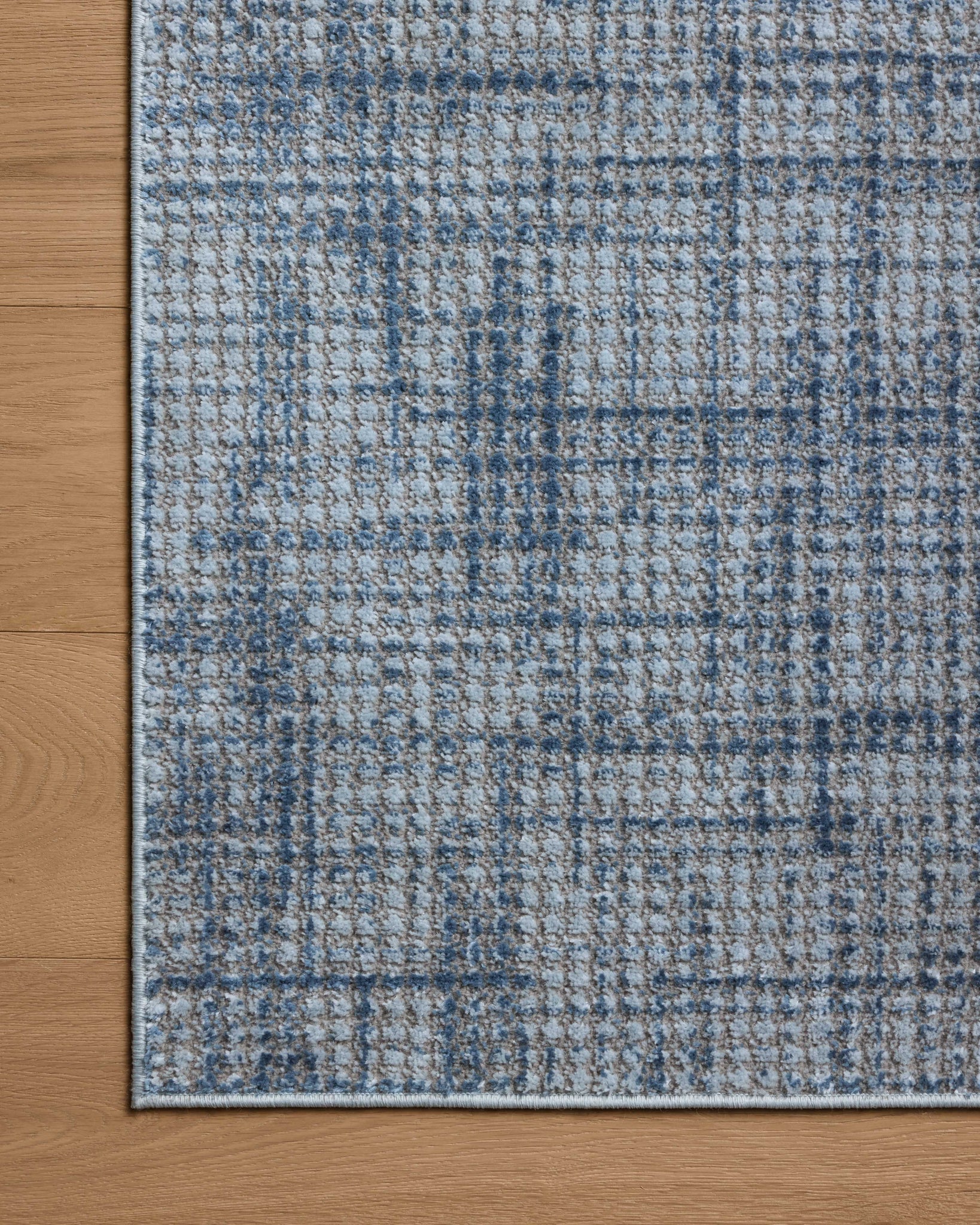 Townes Grey / Denim shown from a different angle to reveal its pattern.