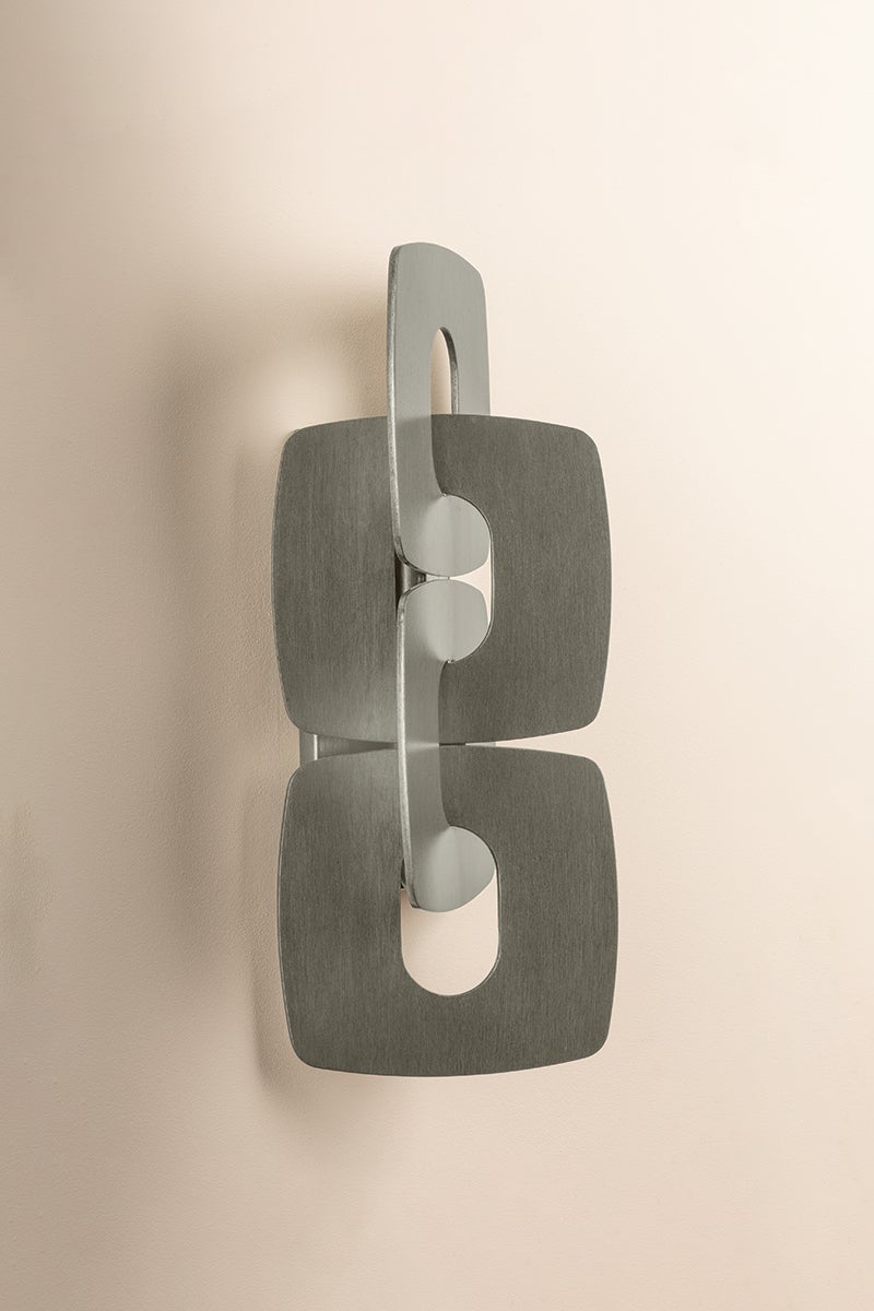 Close-up of the Trentino Wall Sconce showing the arm curve and shade silhouette.