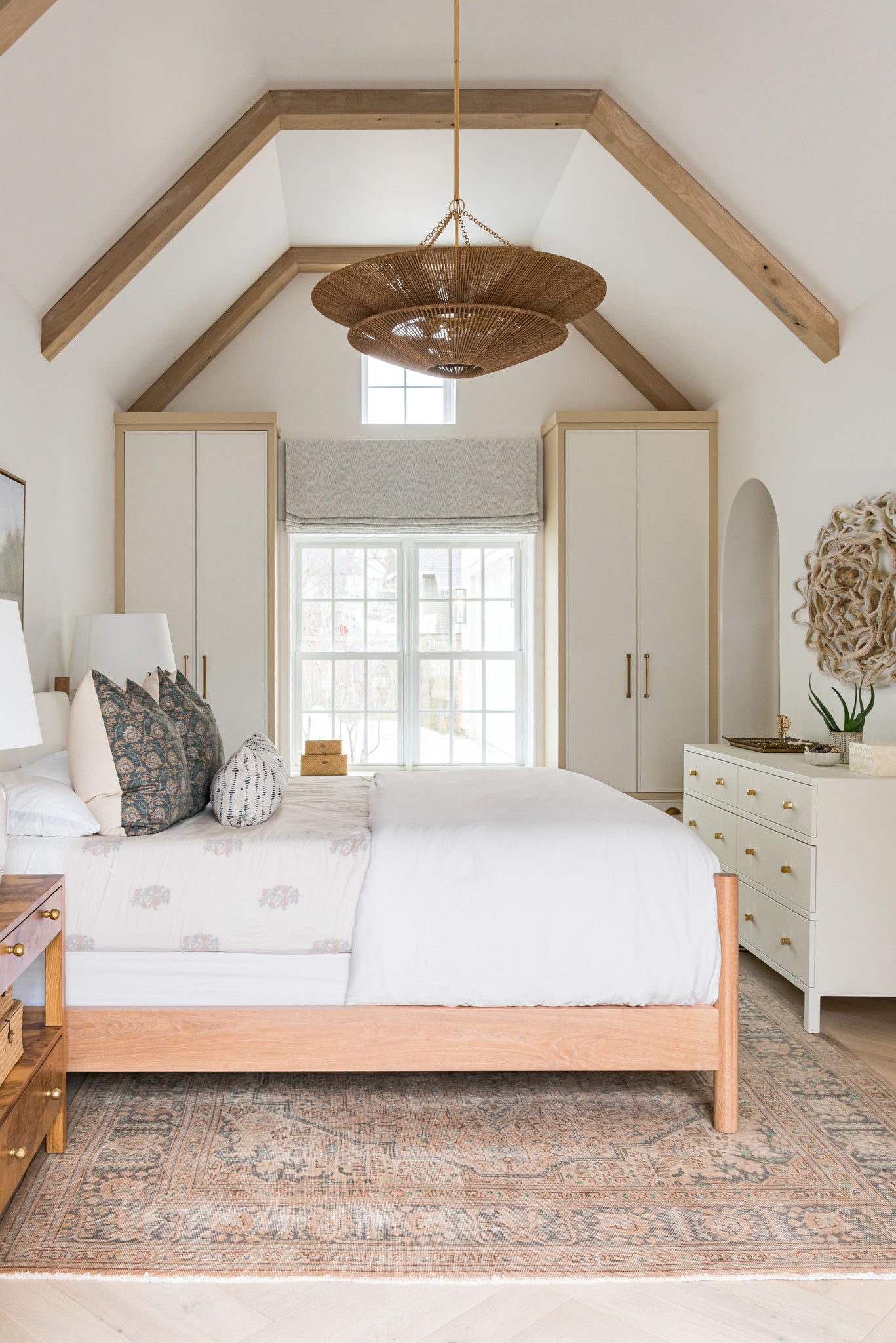 Tropea Chandelier styled in a formal living room for warm, layered light at Laurie Yapp Home.