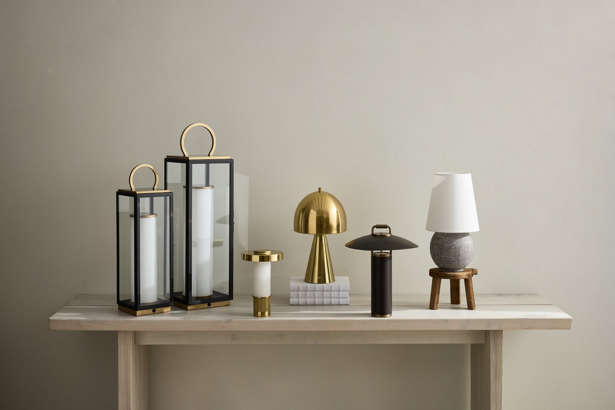 Hopkinton Rechargeable Table Lamp in aged brass styled in a curated interior for warm, layered light at Laurie Yapp Home.