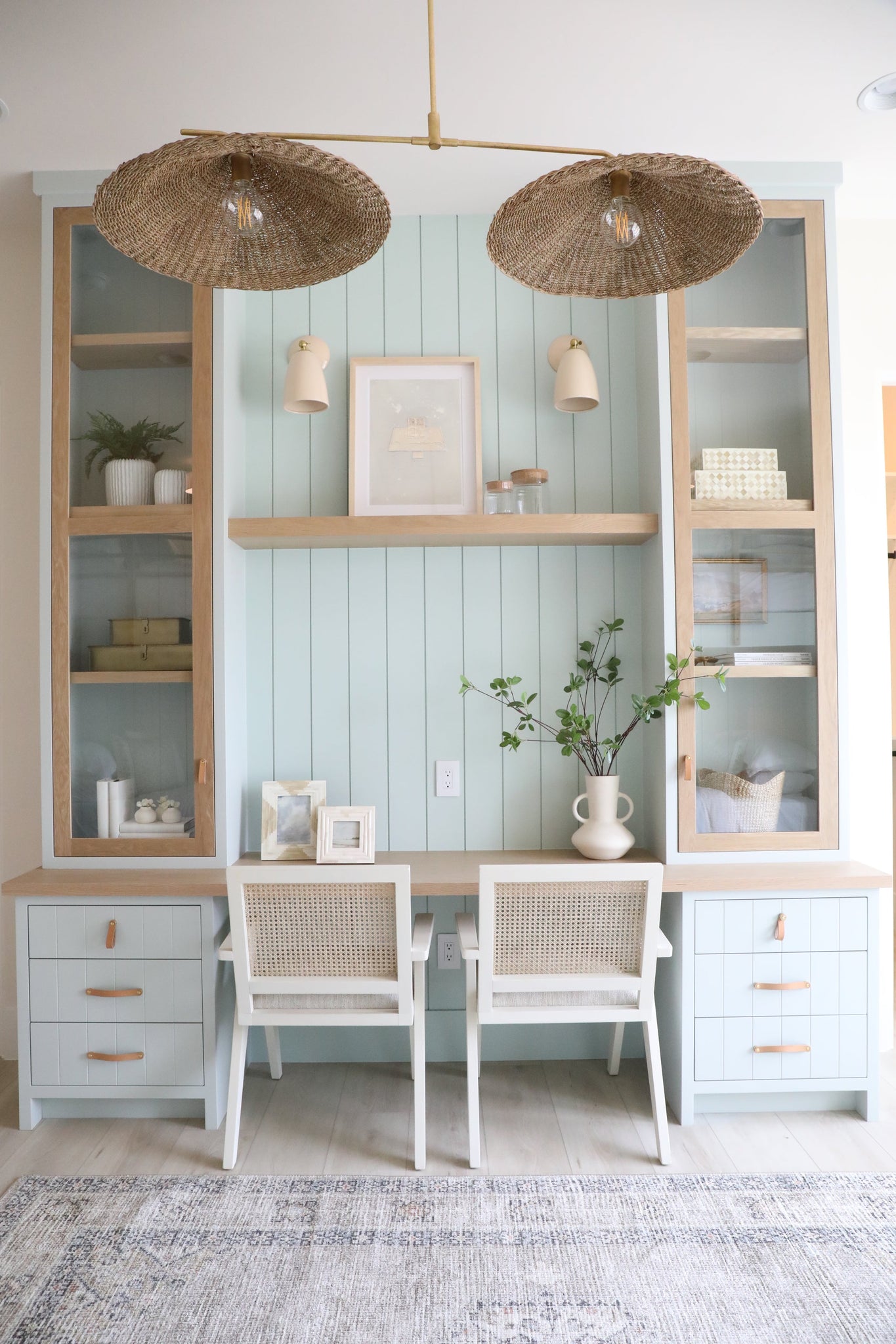 Valier Linear styled in an entry hallway for warm, layered light at Laurie Yapp Home.