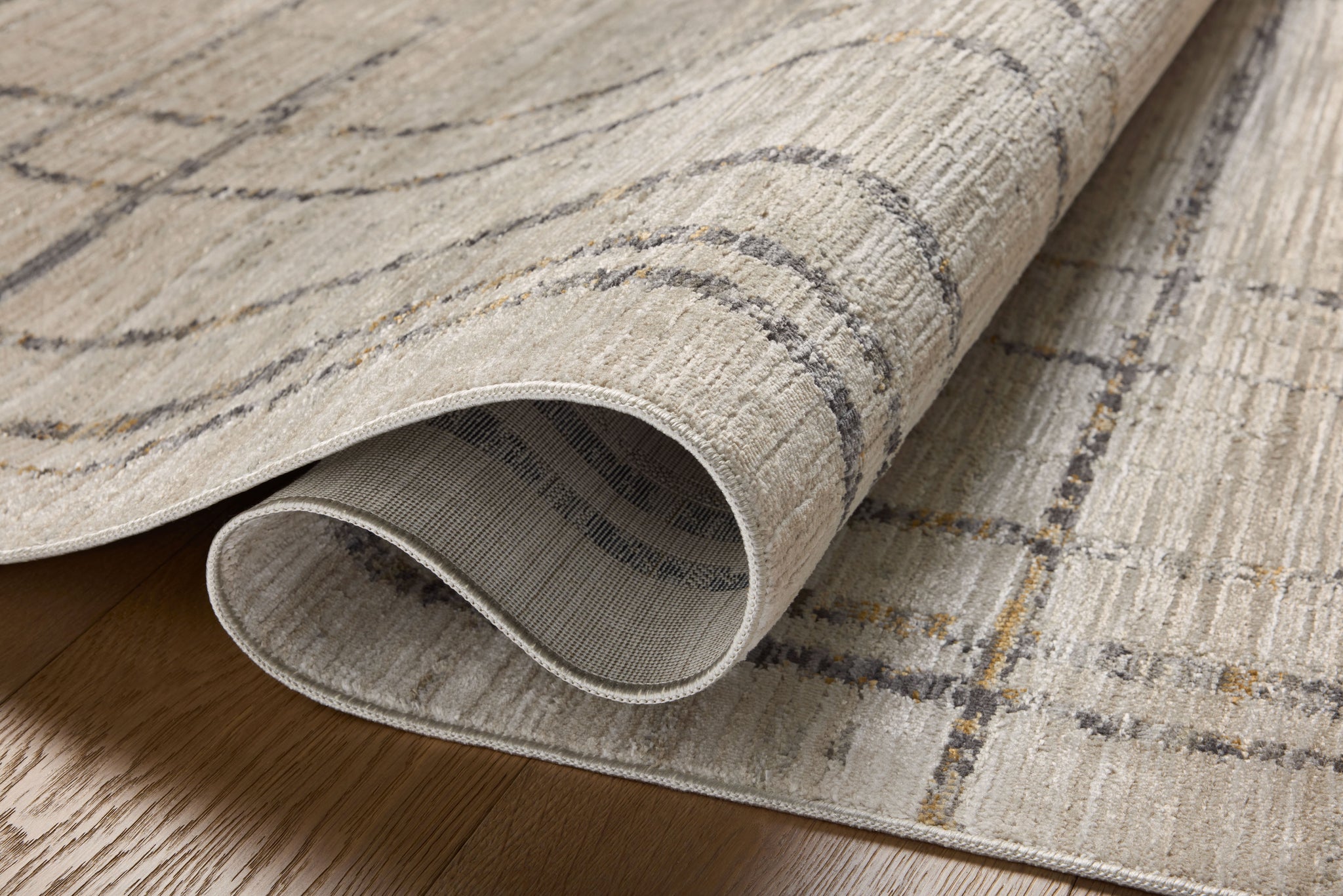 Wade Beige / Midnight shown from a different angle to reveal its pattern.