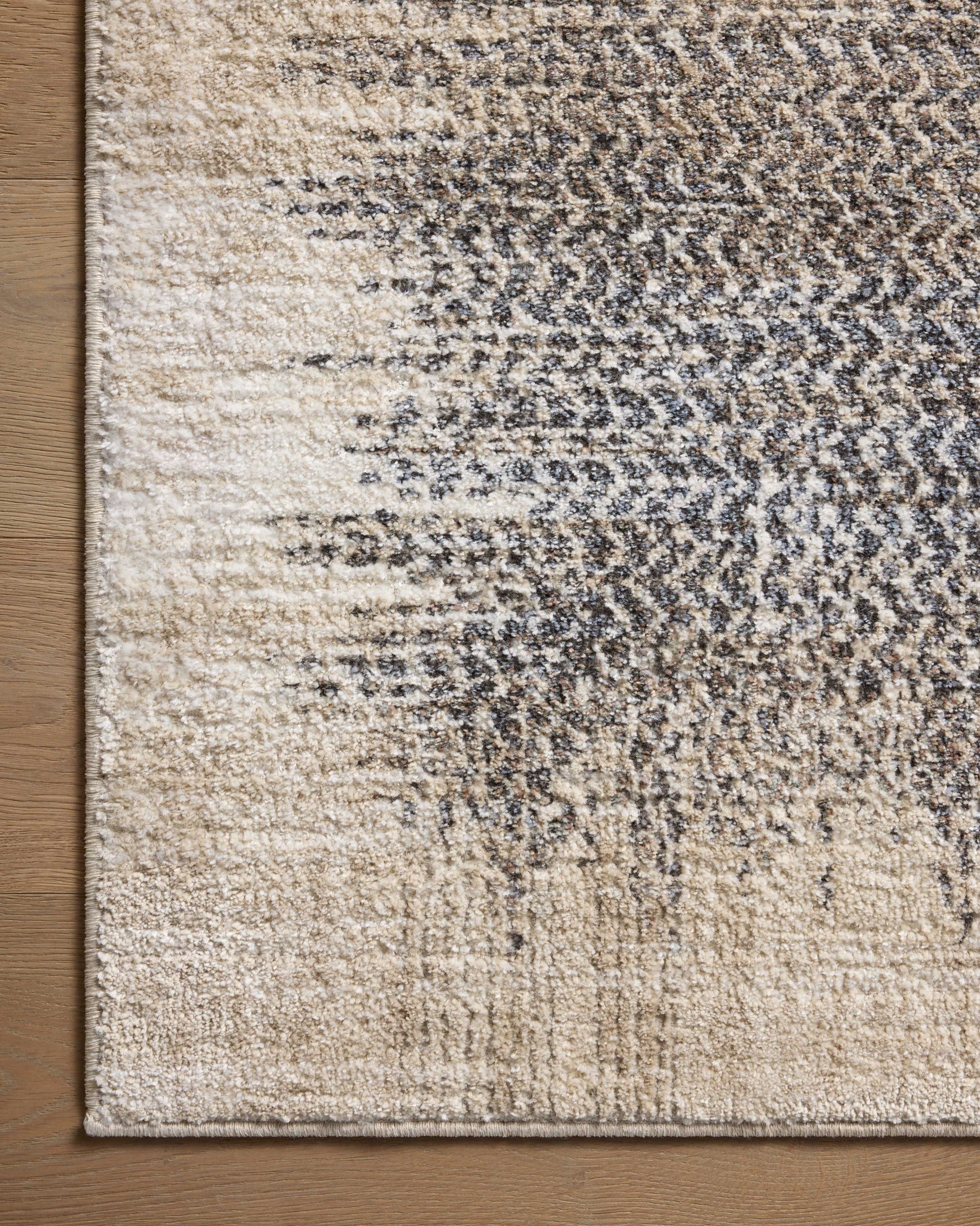 Wyatt Stone / Beige shown from a different angle to reveal its pattern.