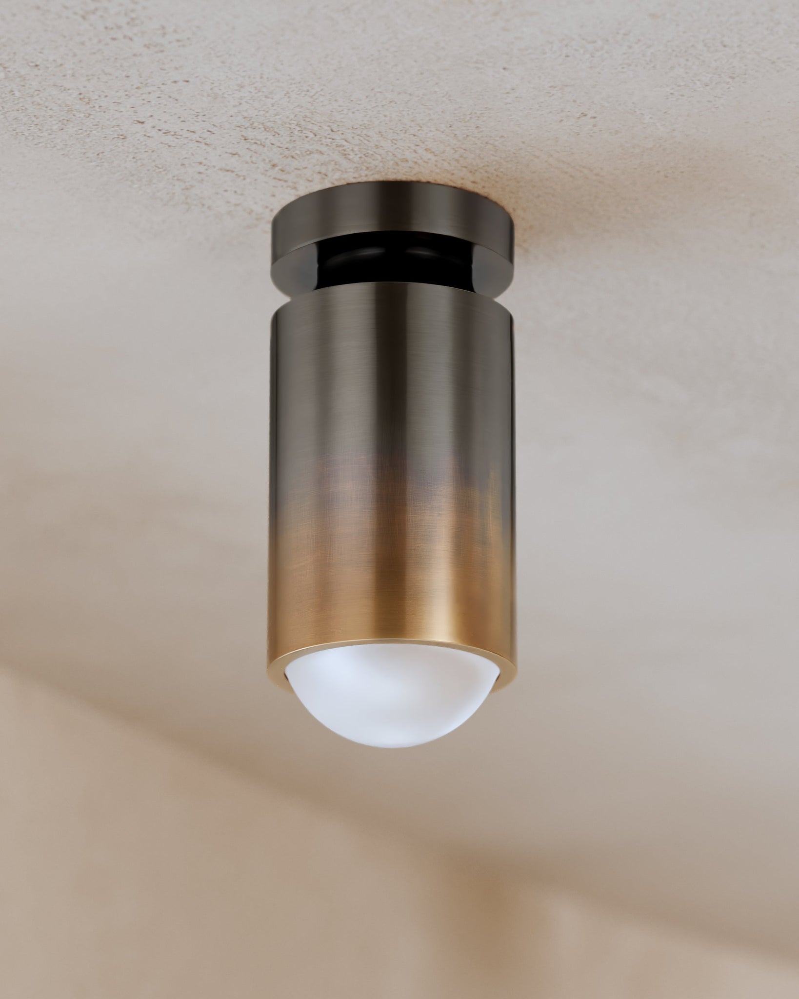Close-up of the Whately Flush Mount showing the shade profile and mounting canopy.