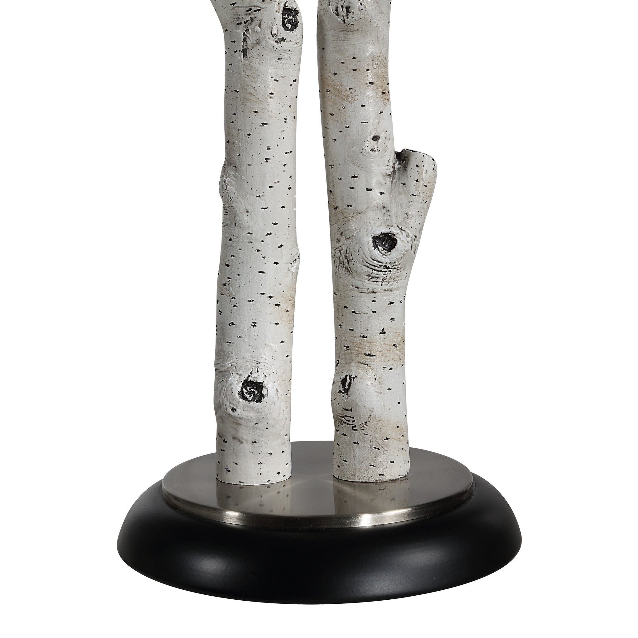 Leandro Table Lamp close-up showing white branch design and black base.