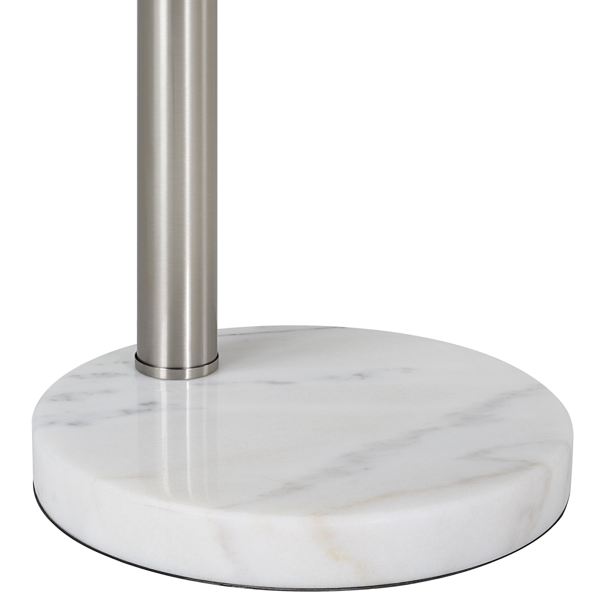 Close-up of Aguillard floor lamp's marble base with a sleek metallic pole.