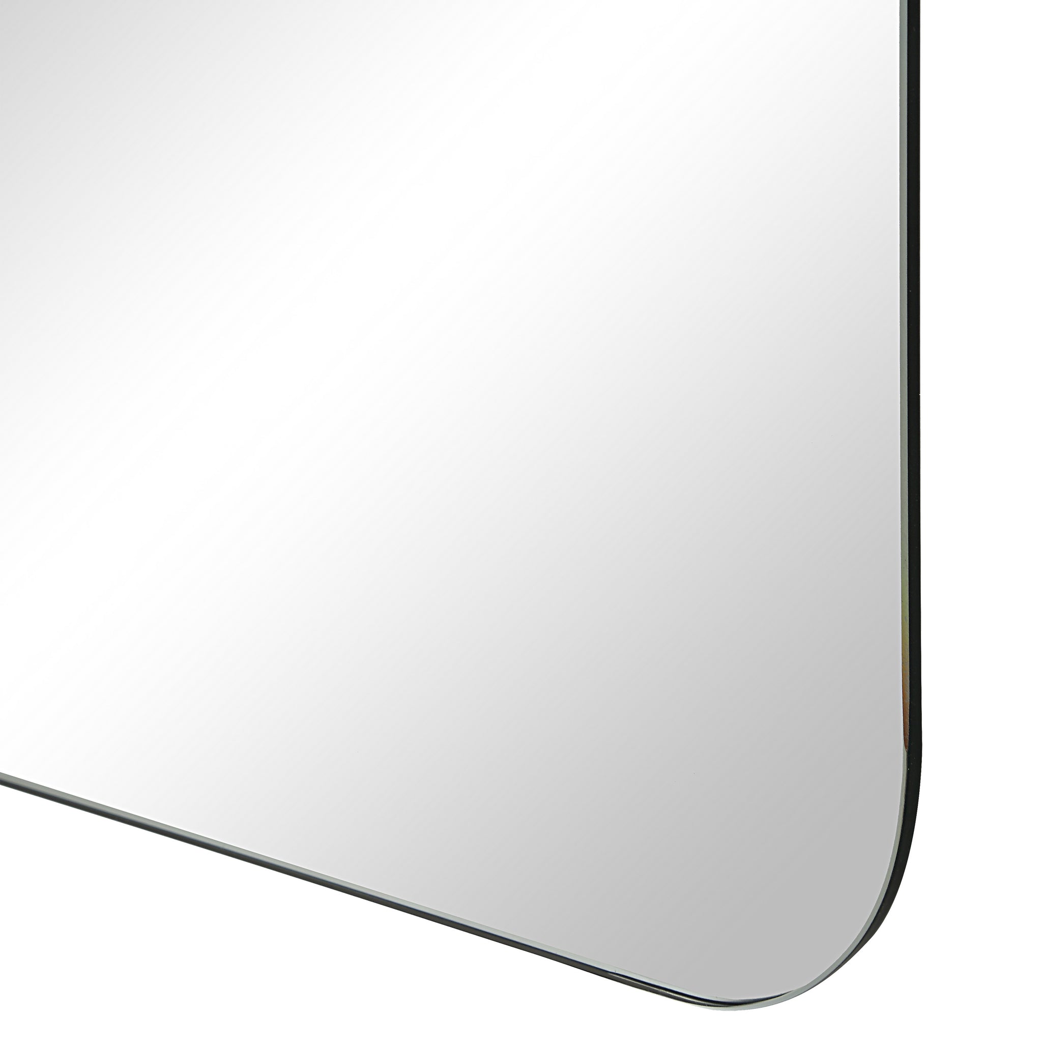 Chania mirror by Renwil, close-up of rounded edge, reflective surface