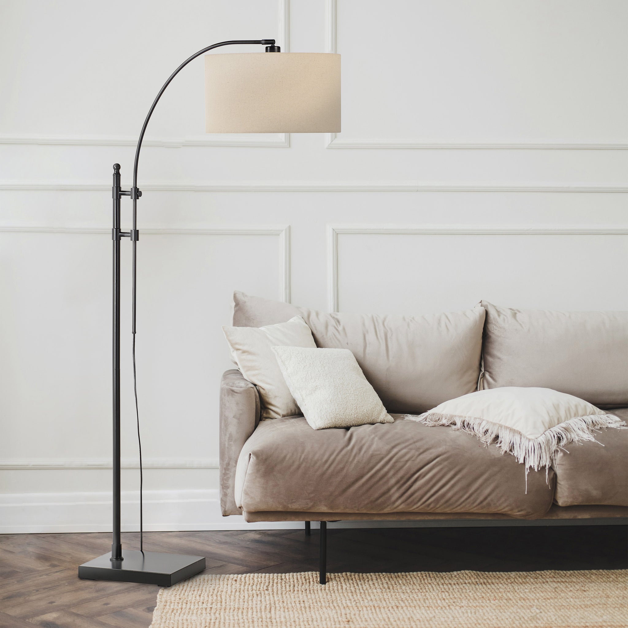 Crystal floor lamp by Renwil next to a beige sofa in a modern living room