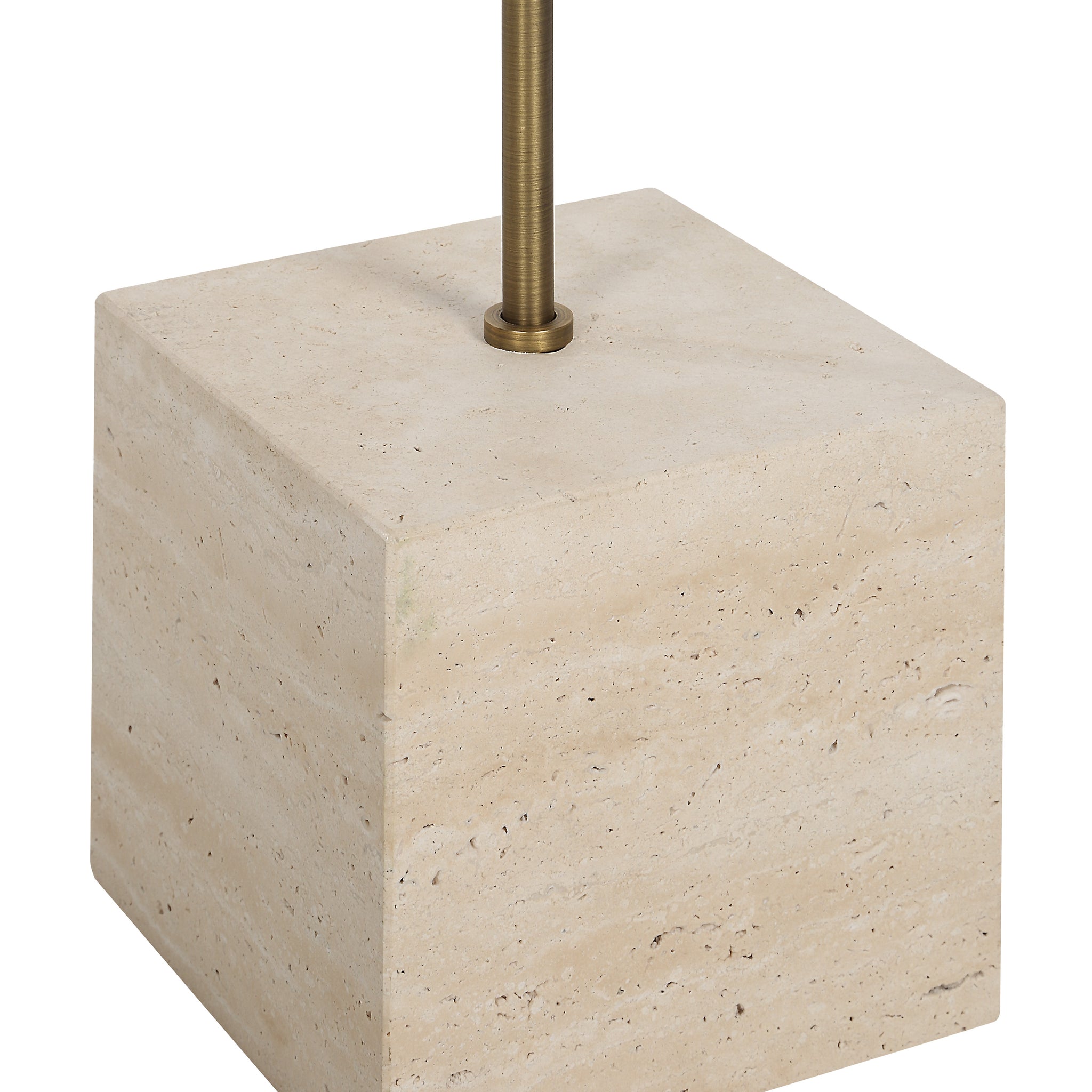 Close-up of Chambers candle holder showing the beige stone base and brass stem