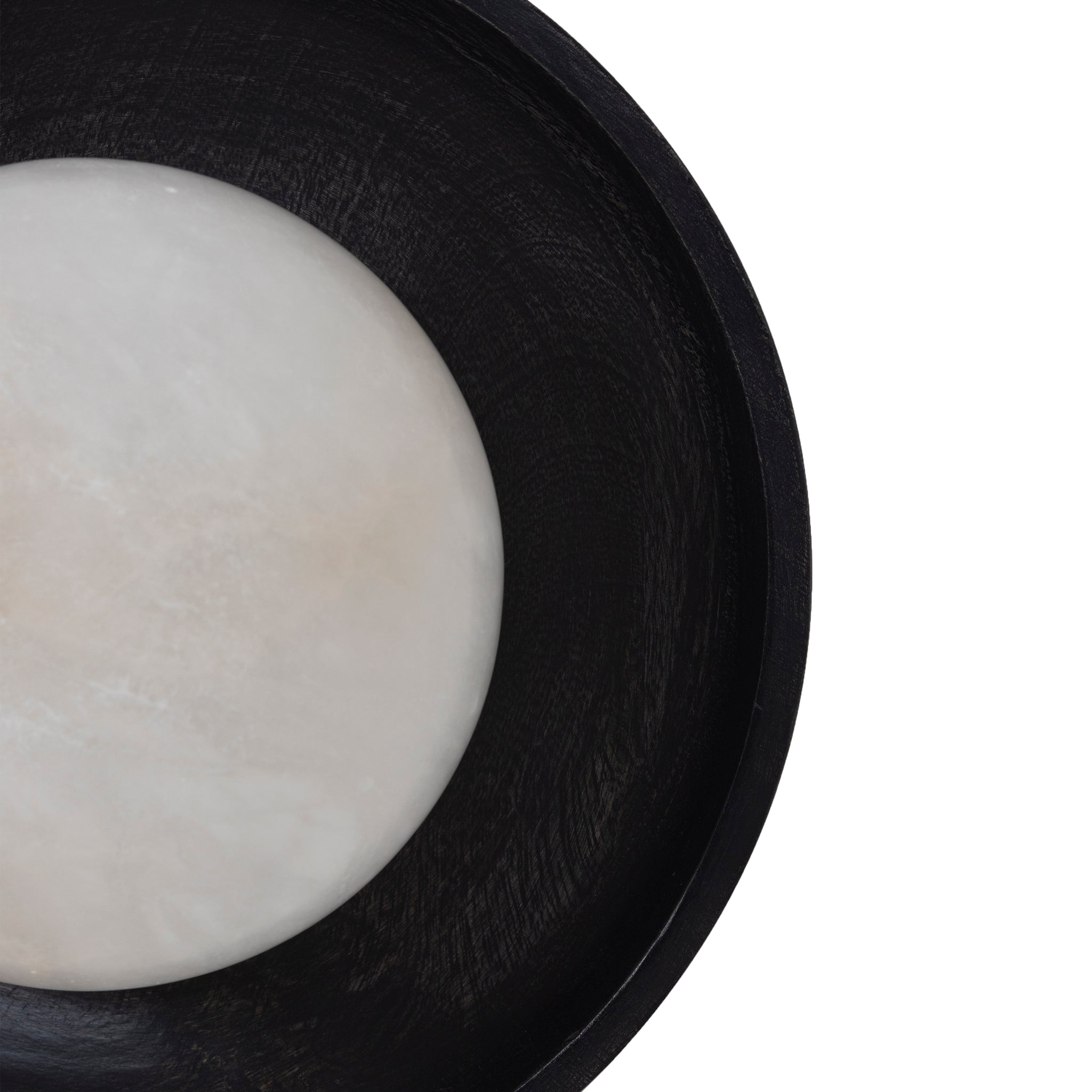 Haloa wall sconce showing a round white alabaster bulb set in a black wooden base