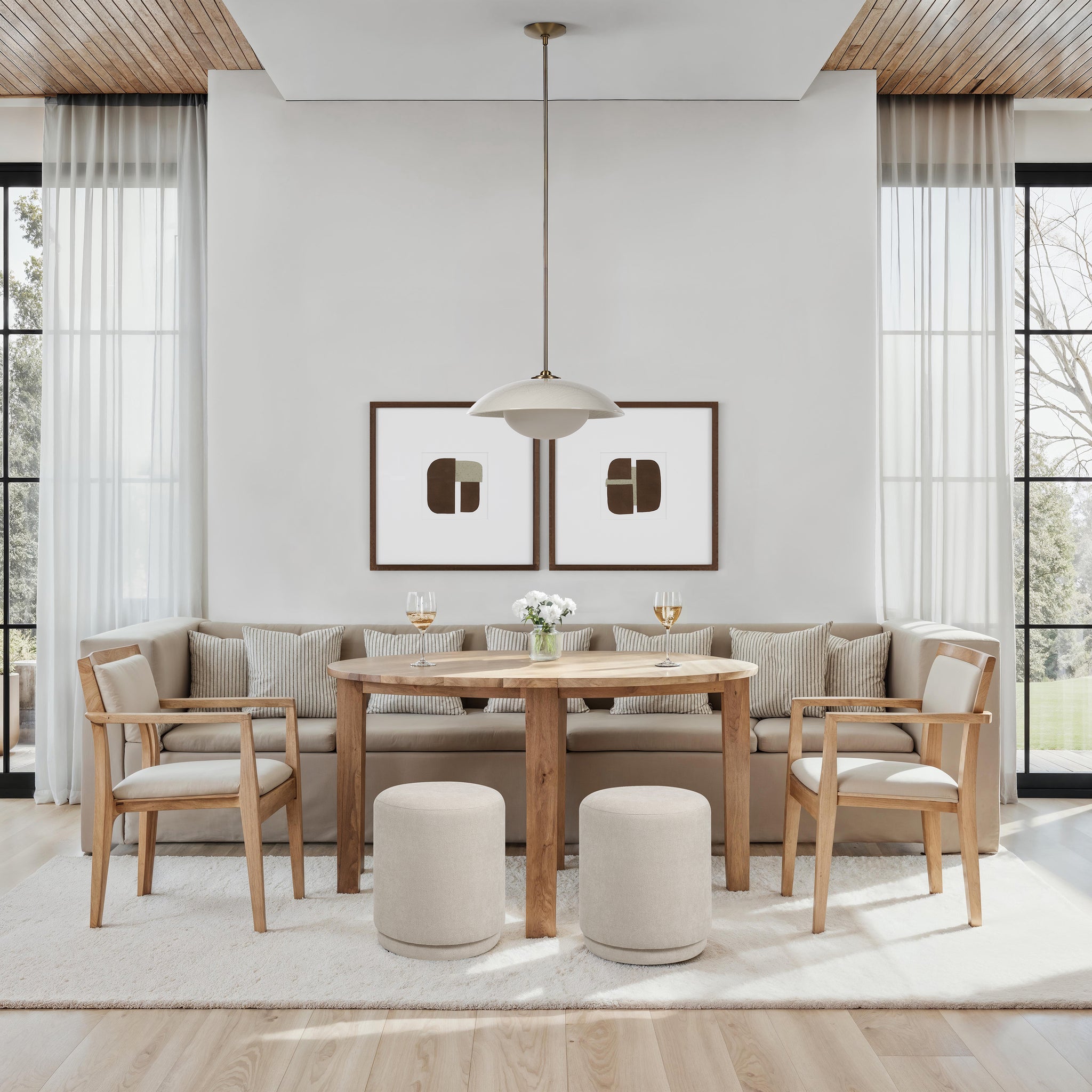 Abbie ceiling light fixture above a round wooden table in a modern dining area