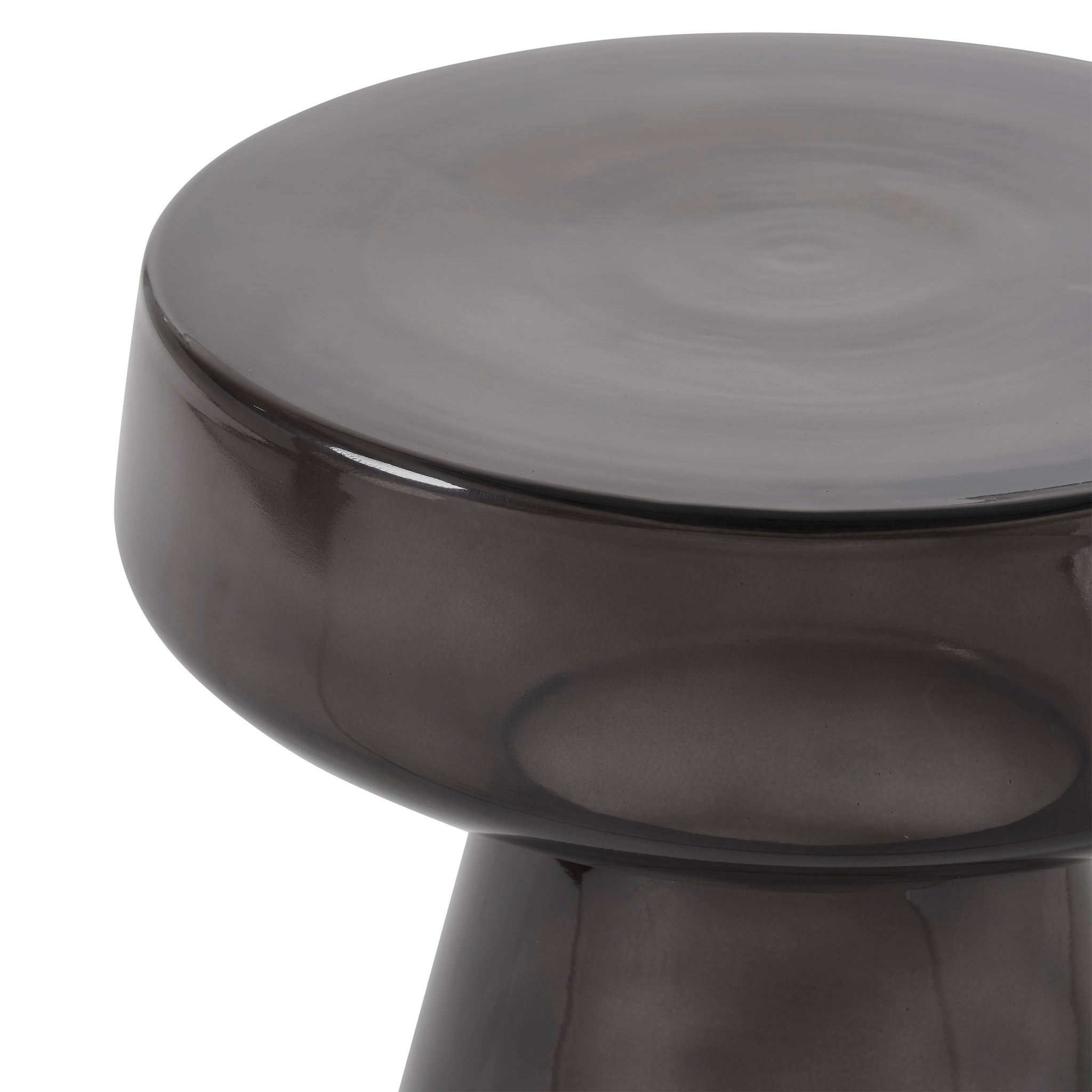 Lavinia table in dark smoke color highlighting the smooth rounded top