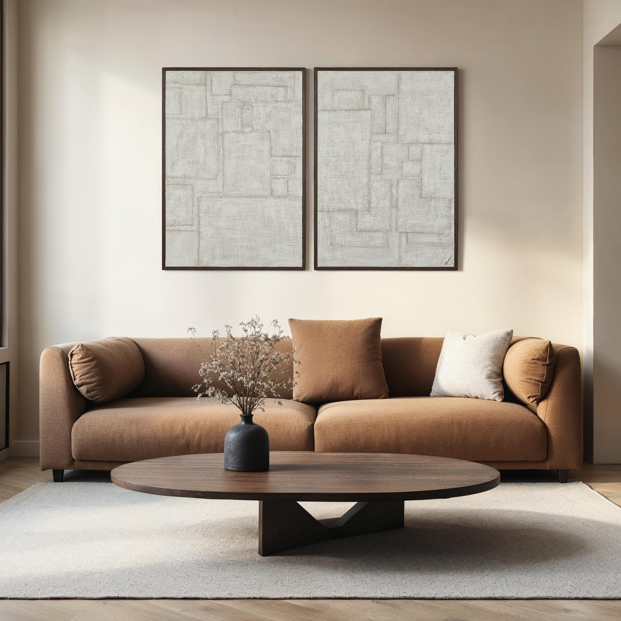 Living room setting featuring Caramelo wall art above a brown sofa with decorative vase.