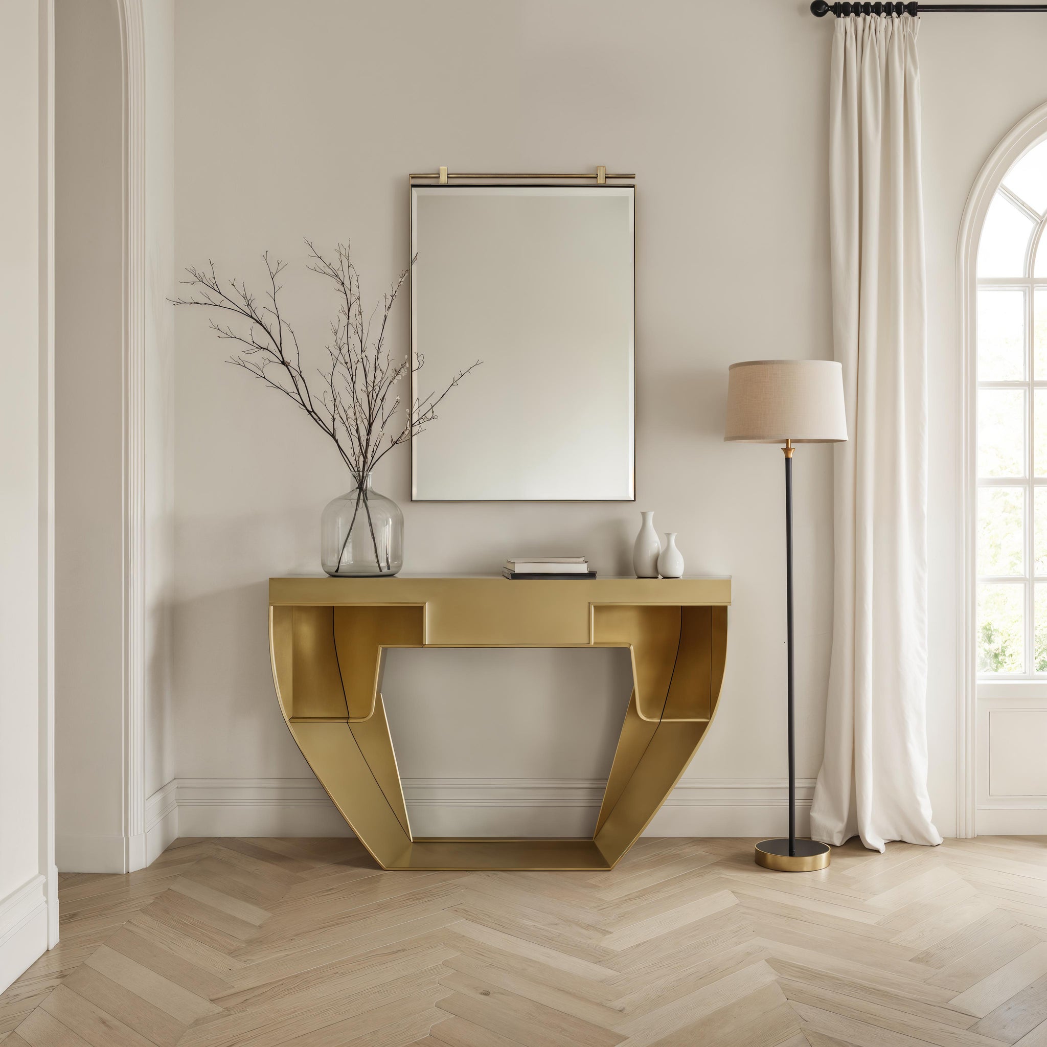 Neem mirror by Renwil displayed above a gold console table in a modern interior setting.