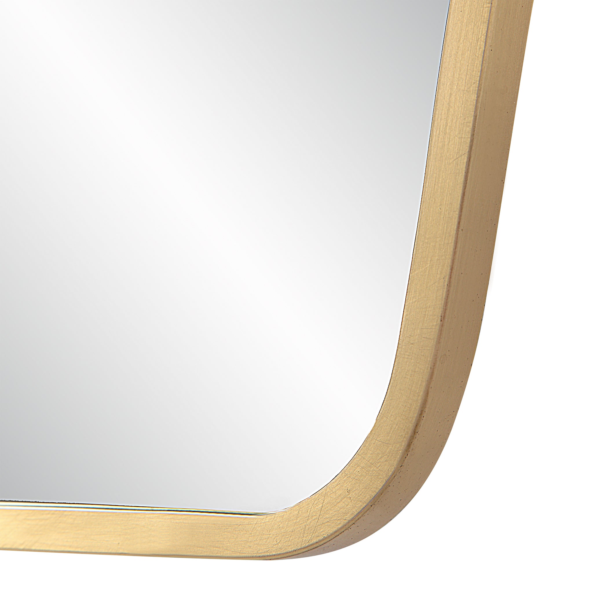 Close-up of Mocha Wall Mirror's gold frame highlighting its smooth edges