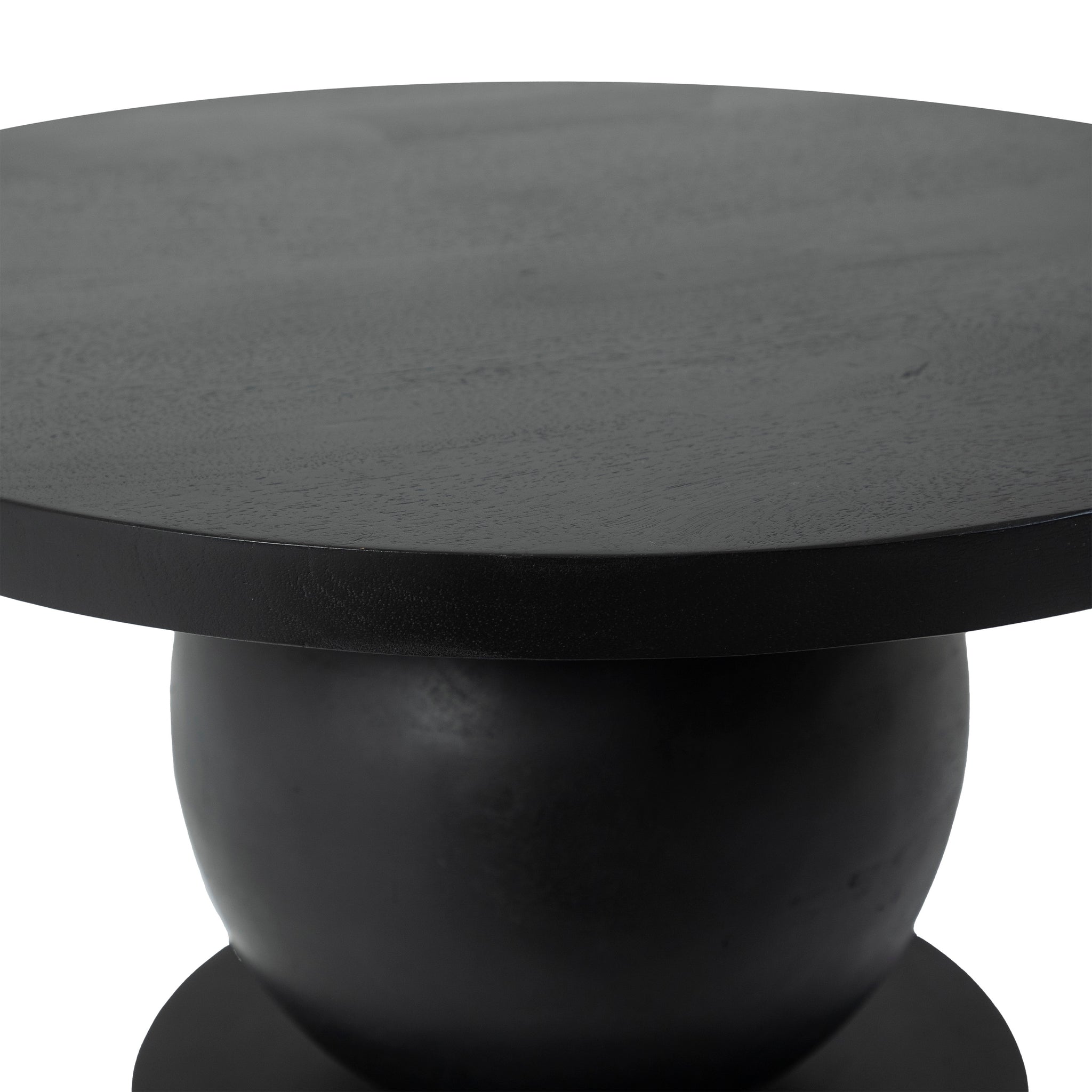 Top view of Paola side table showcasing its smooth black surface.