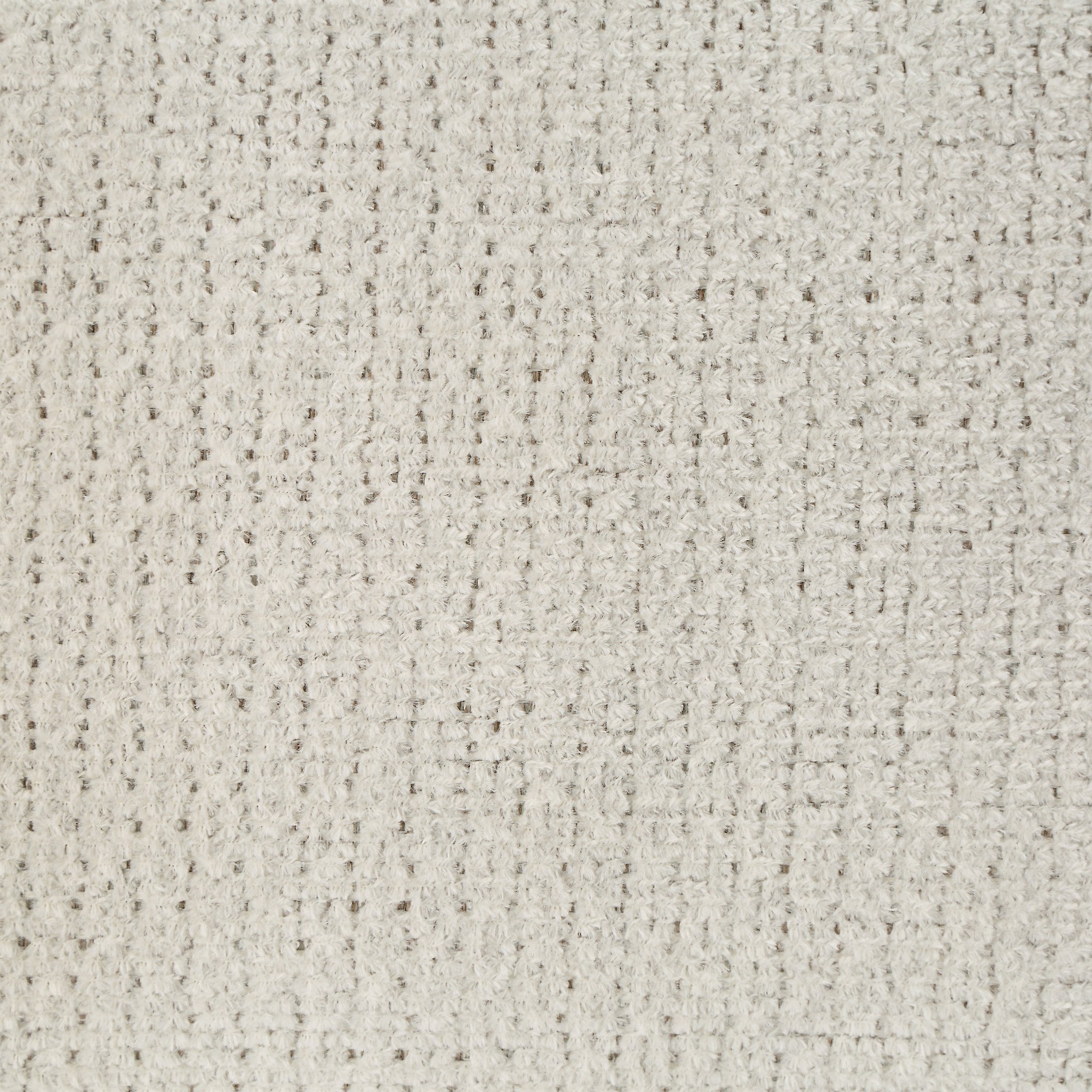 Close-up of Bolero indoor pillow fabric, showcasing its textured pattern.