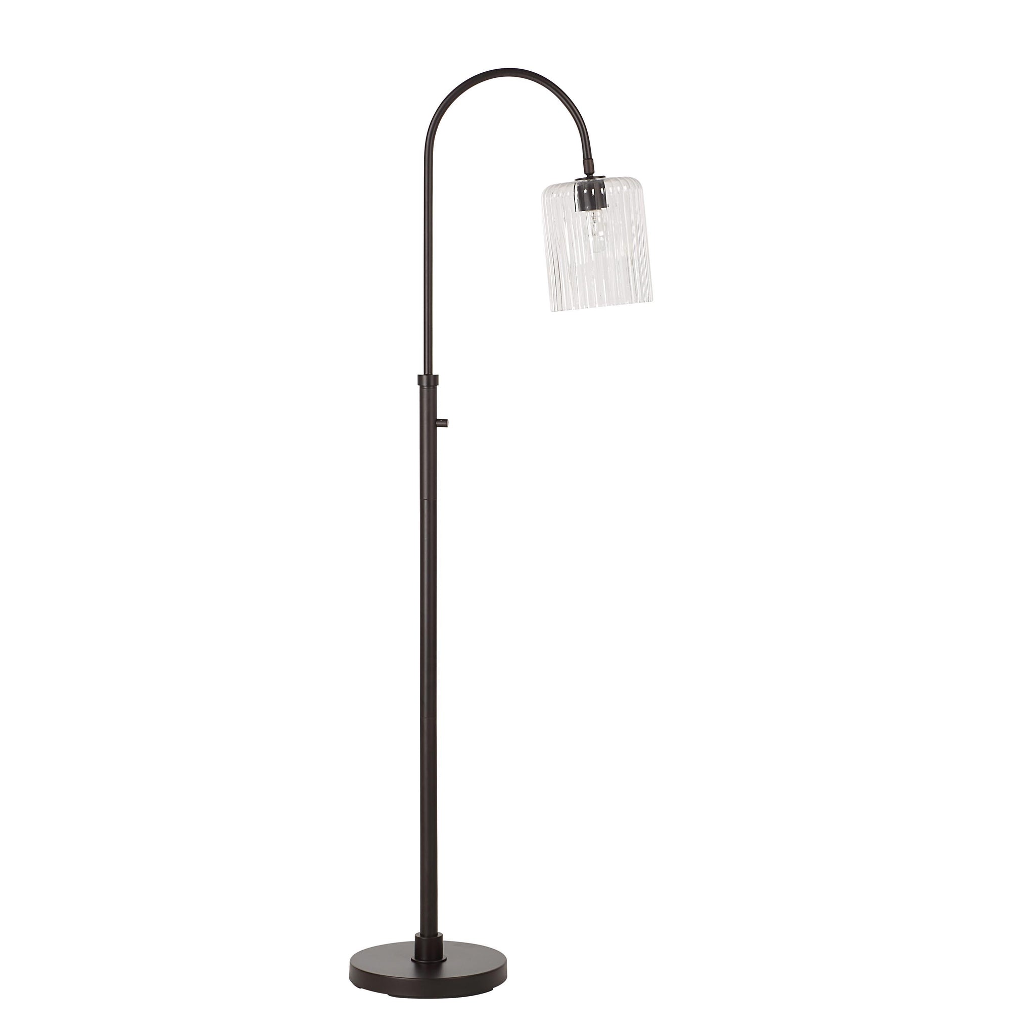 Danae floor lamp with a curved arm and clear ribbed glass shade, black metal base.