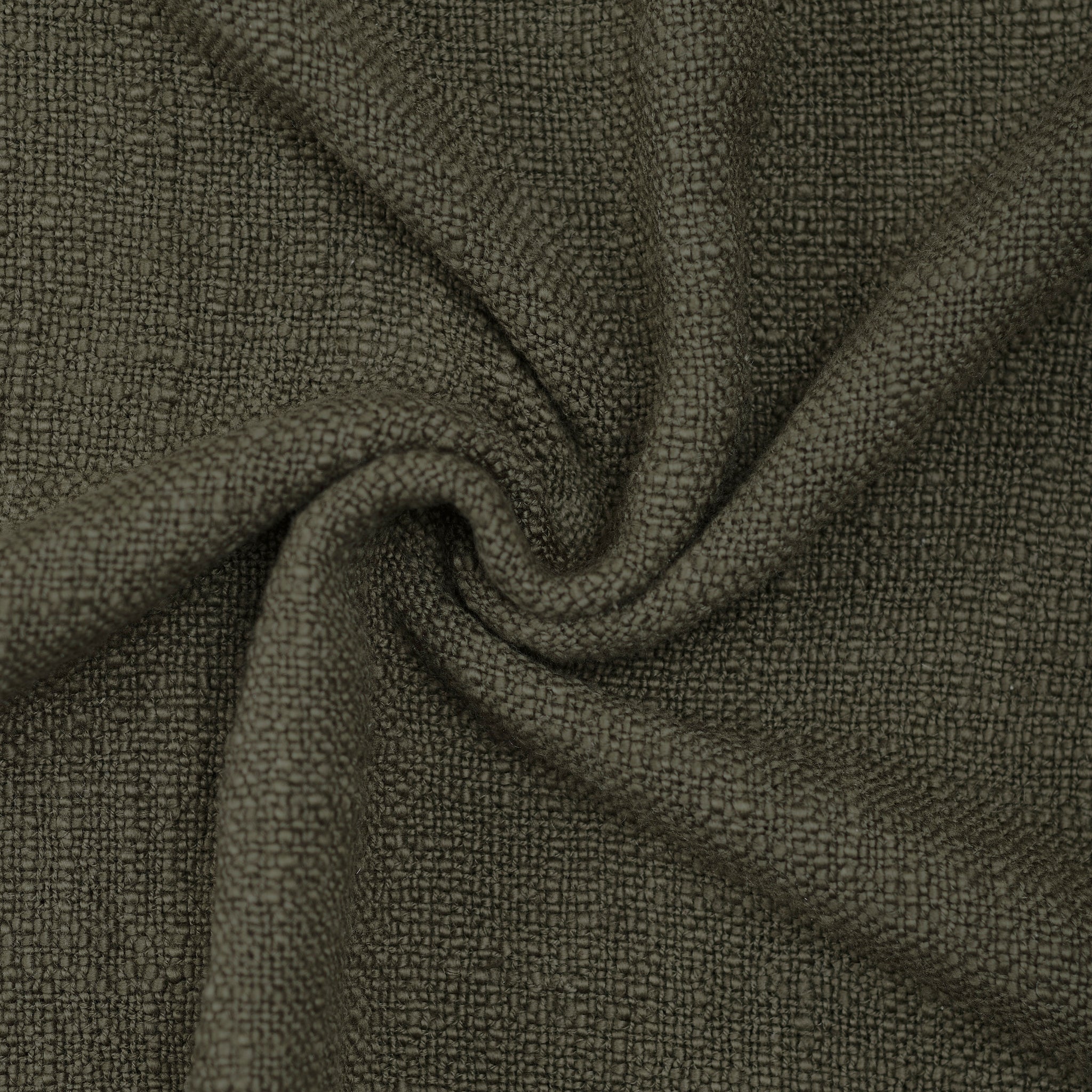 Detailed view of Chalamet Throw Blanket fabric in dark green, showing soft texture.
