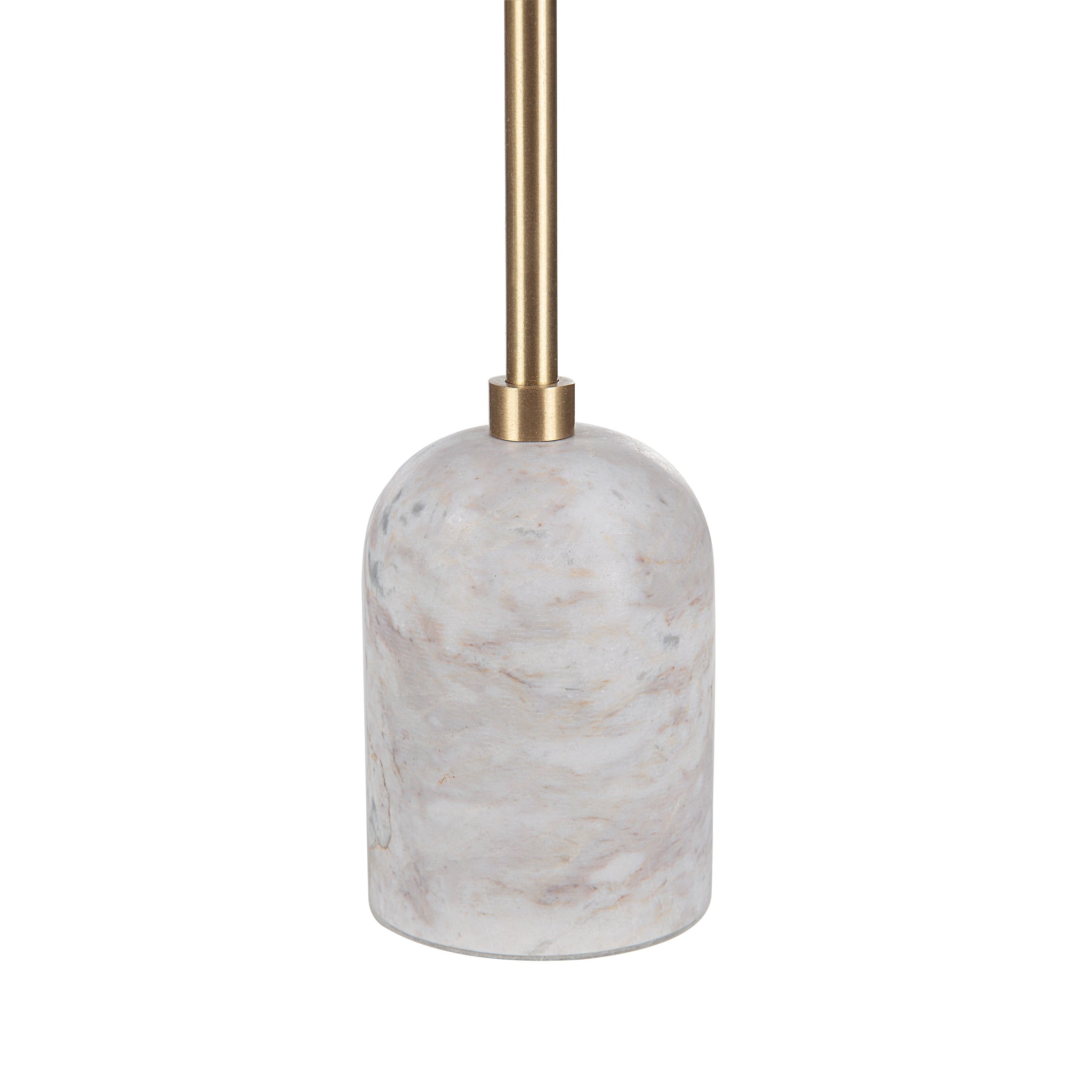 Close-up of a Marchesa tapered candle holder featuring a marble base and gold metal stem