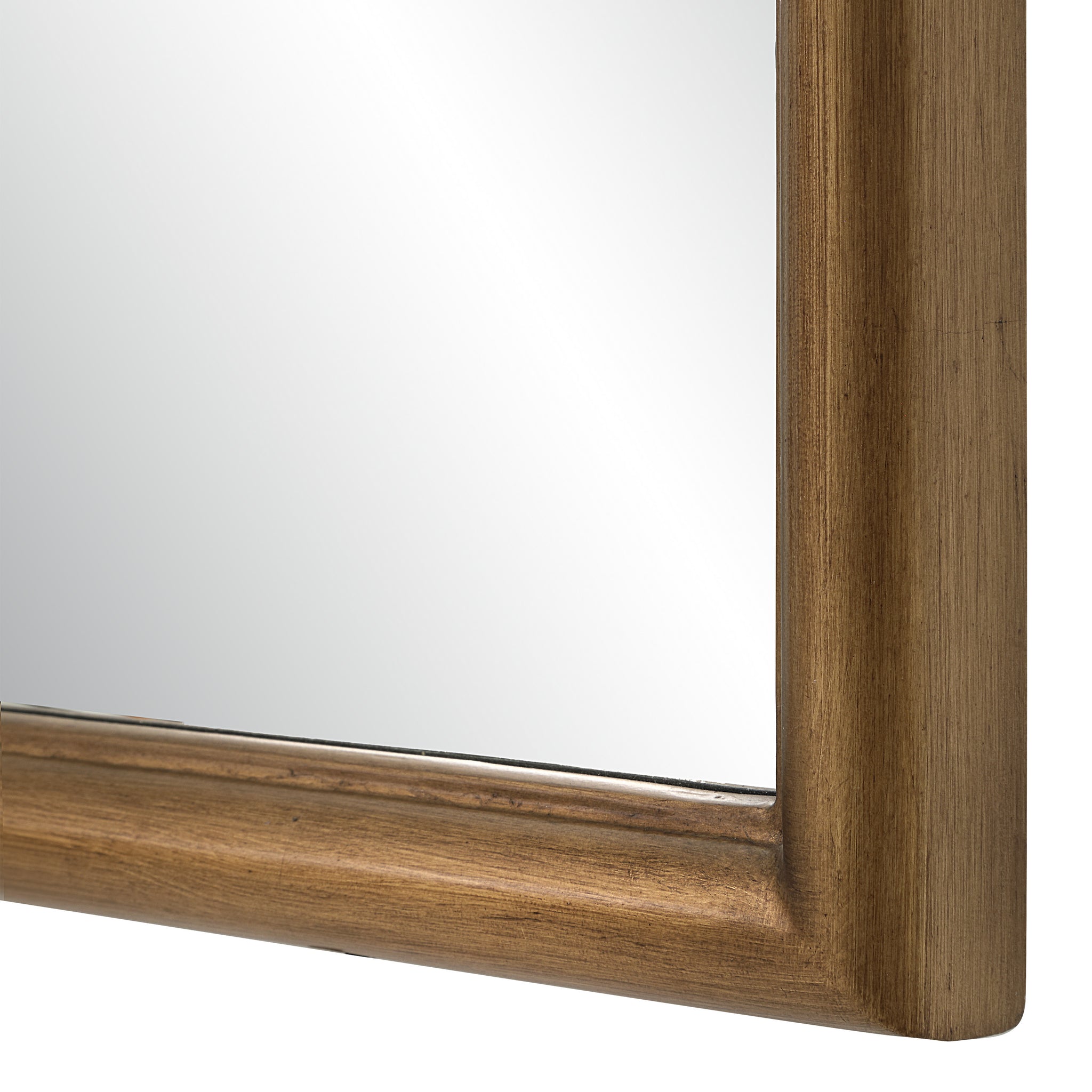 Close-up of Emilien mirror's gold-toned frame and reflective surface.