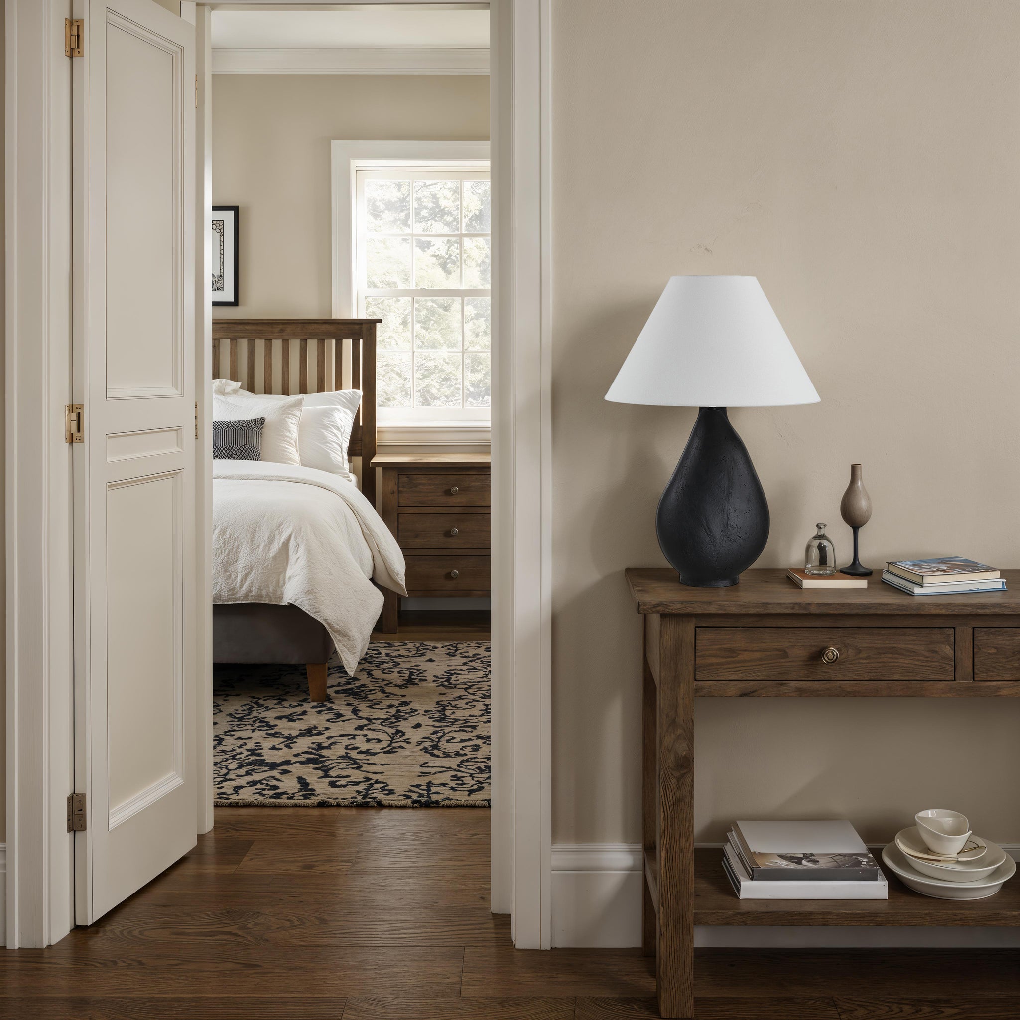 Sotiria Table Lamp on a wooden console in a cozy bedroom setting