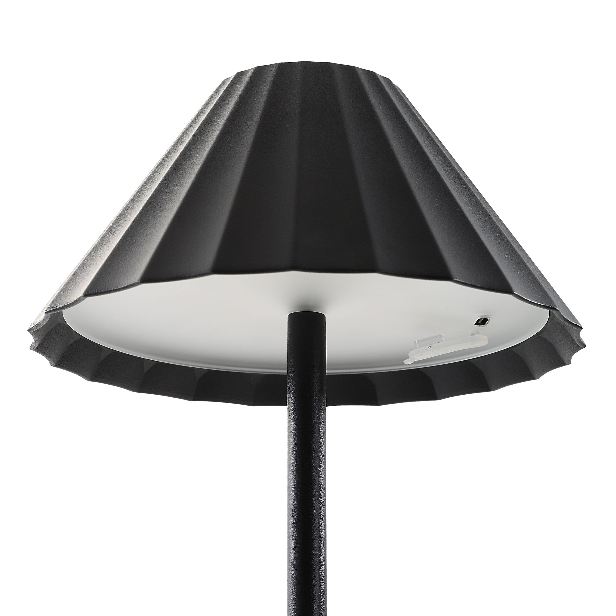 Giada Table Lamp by Renwil, close-up of black pleated shade, white interior, modern aesthetics