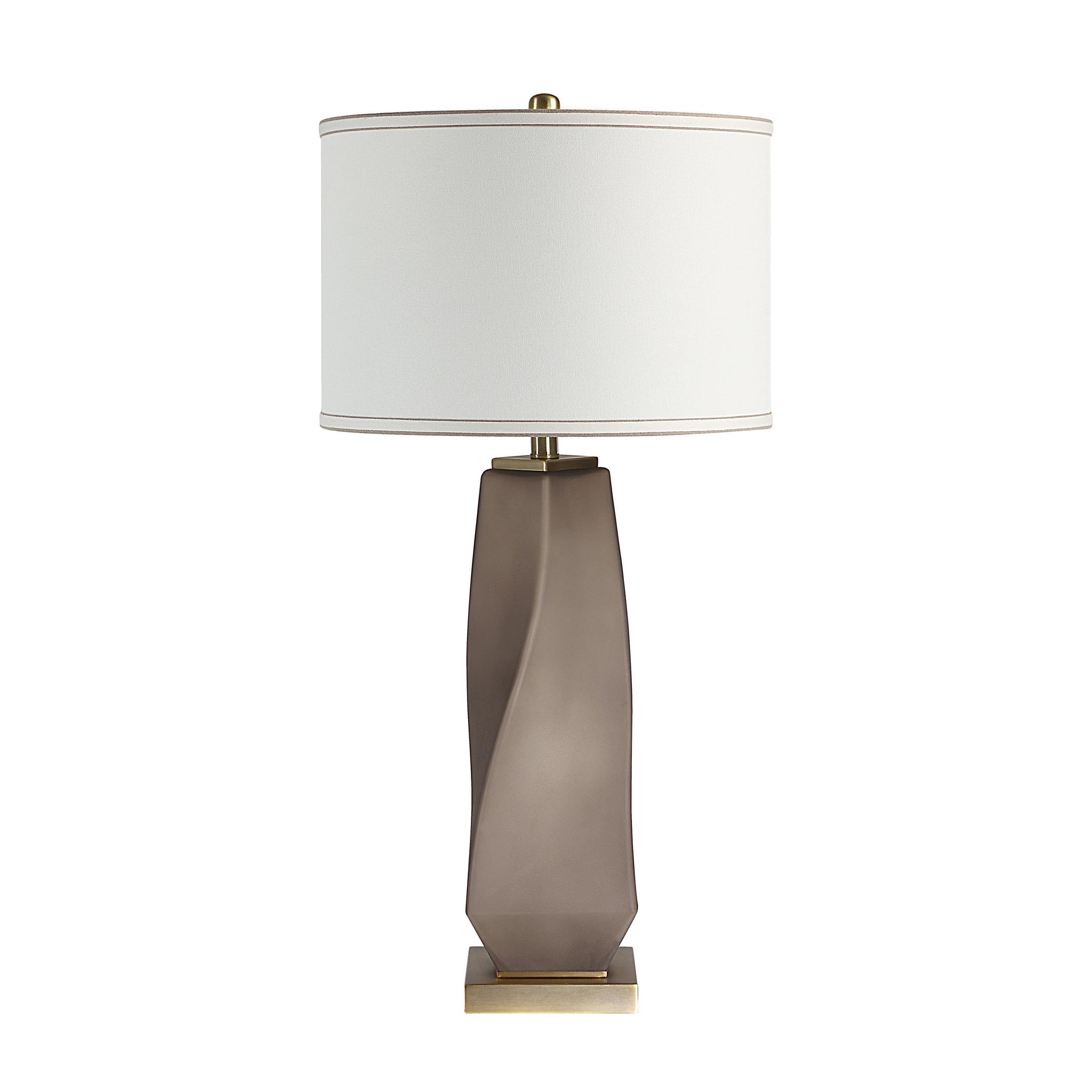 Mallorca table lamp featuring a sleek gray base and a white shade with gold trim