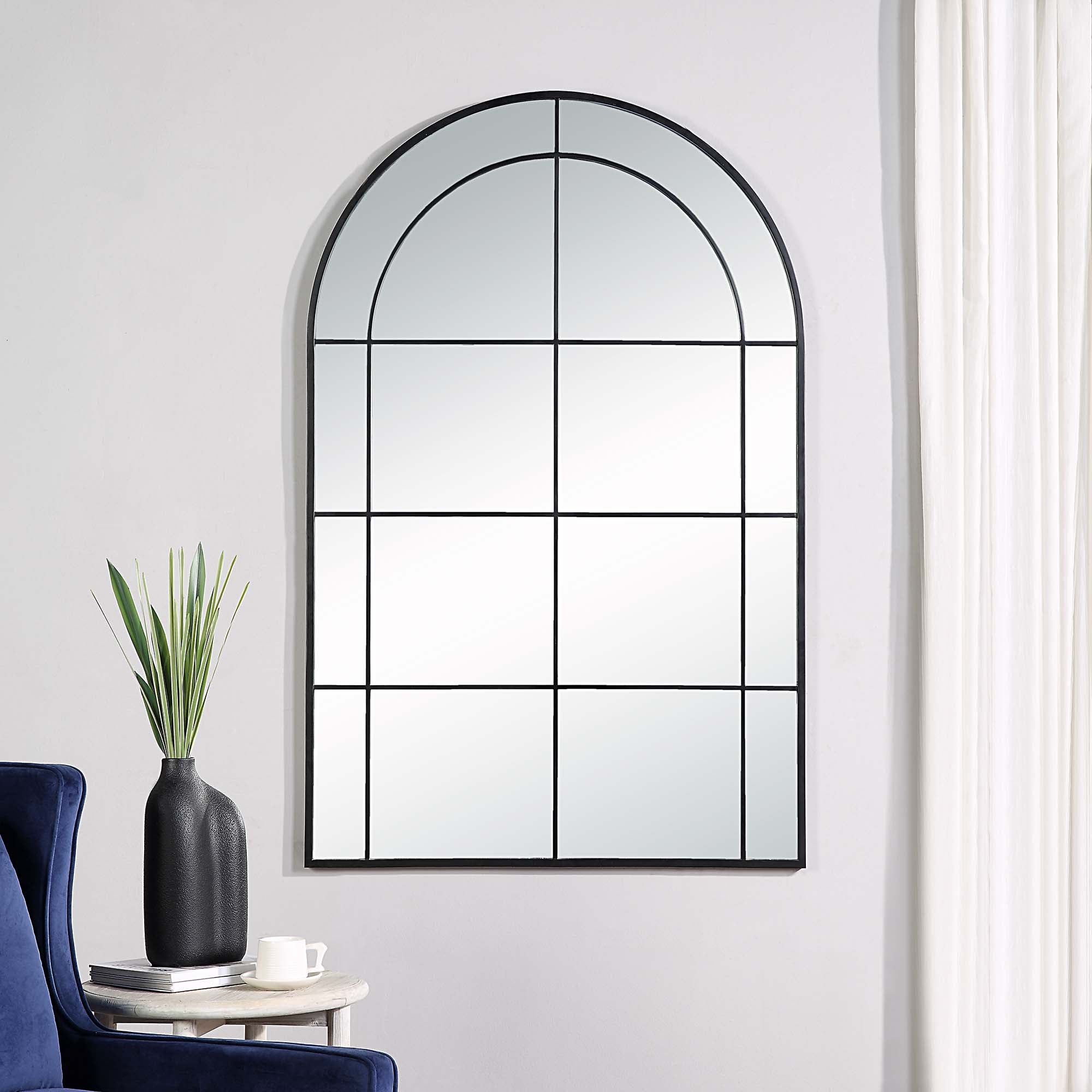 Atkinson Full Length Mirror displayed in a room with a plant and chair