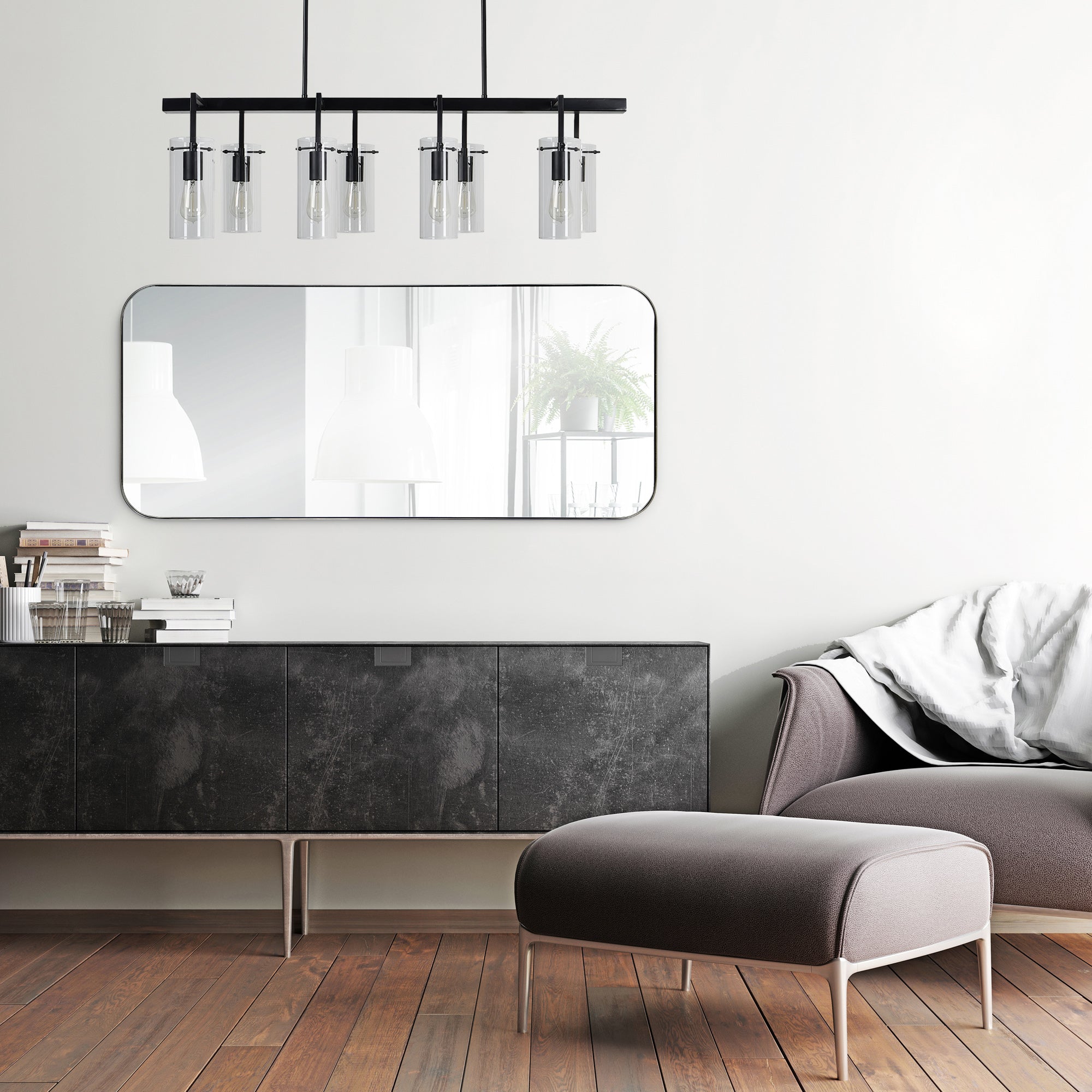 Delphinus Wall Mirror displayed above a modern black sideboard in a stylish living room