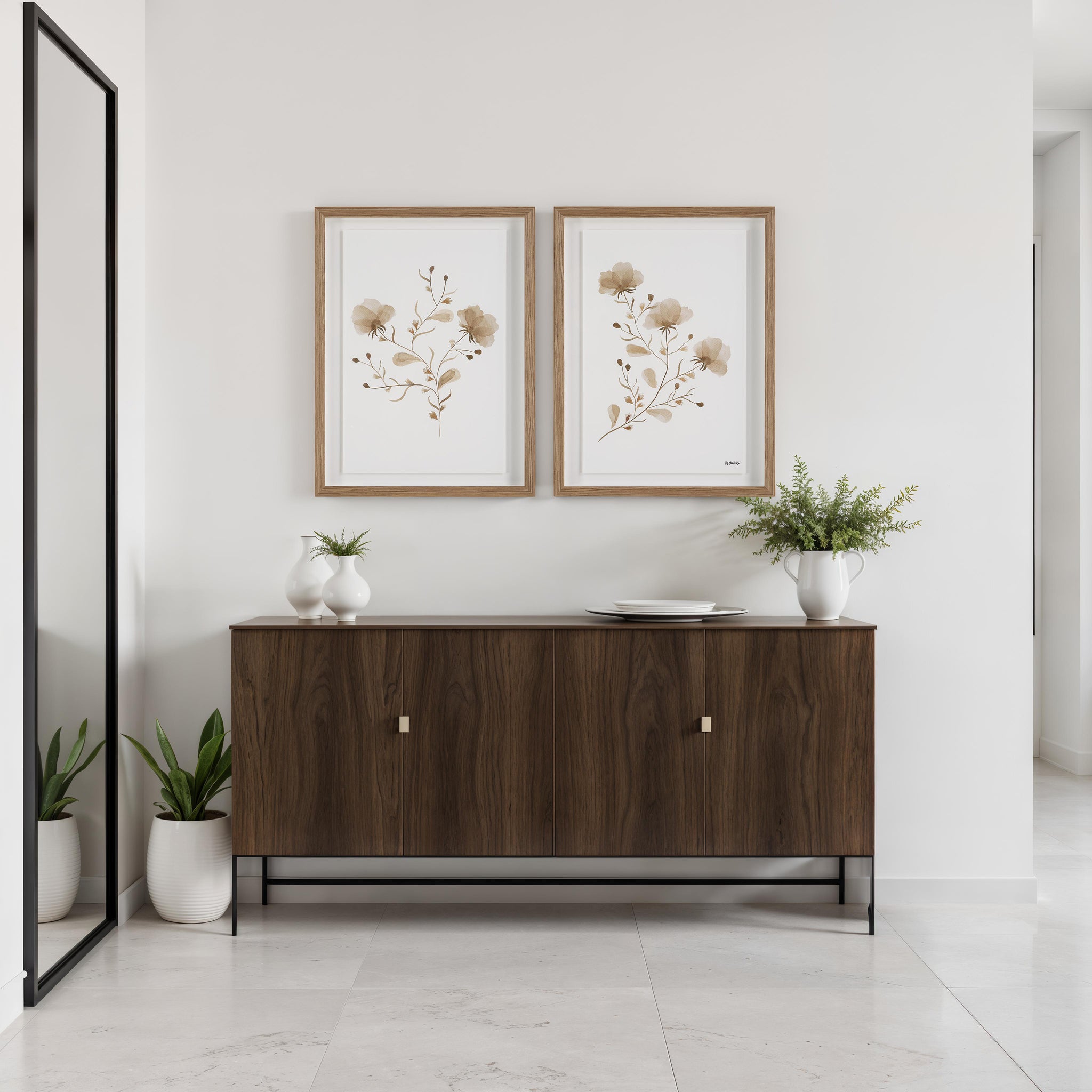 Madalena wall art displayed above a wooden sideboard with plants and decor.