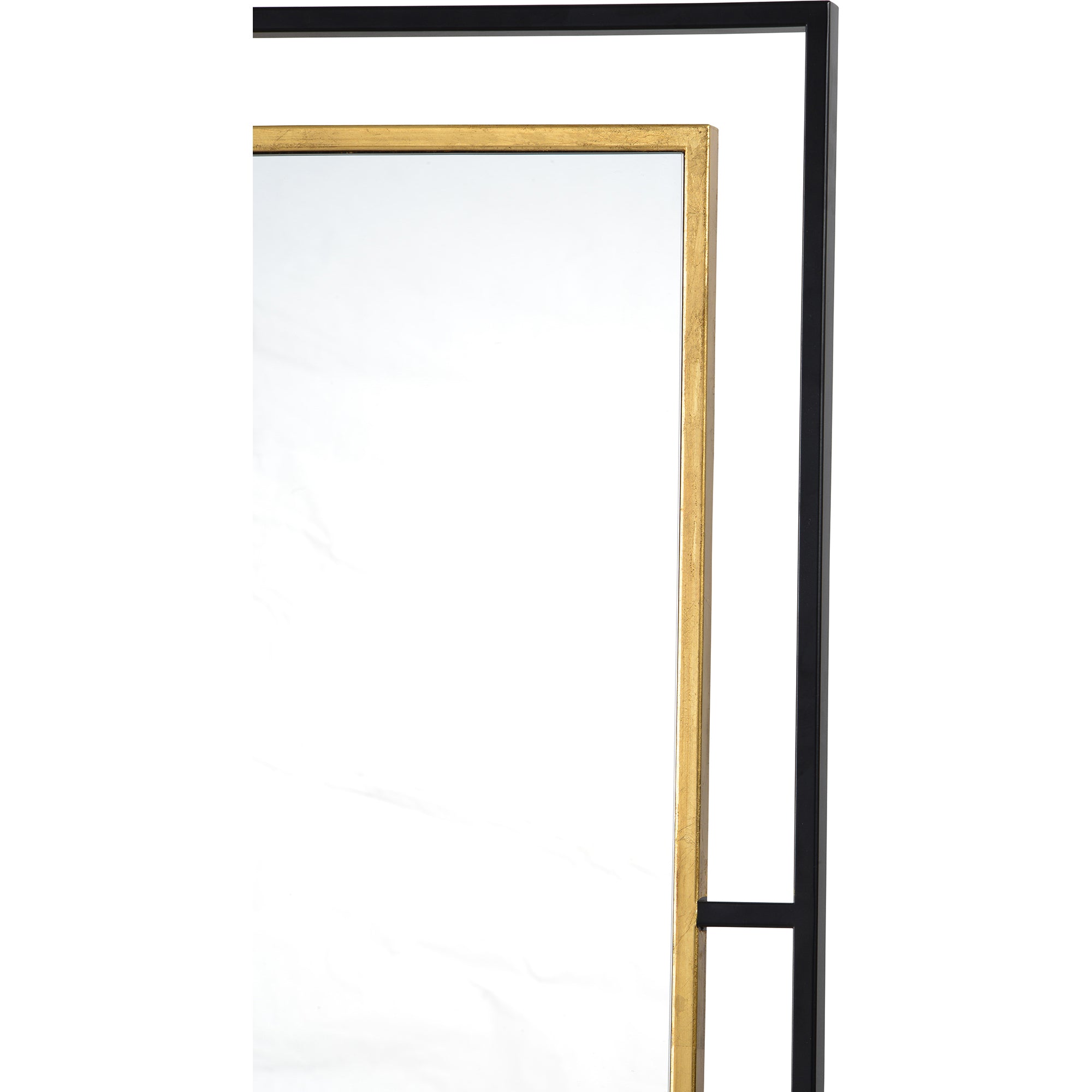 Close-up of a gray wall mirror with a gold border and black frame, highlighting the edges.