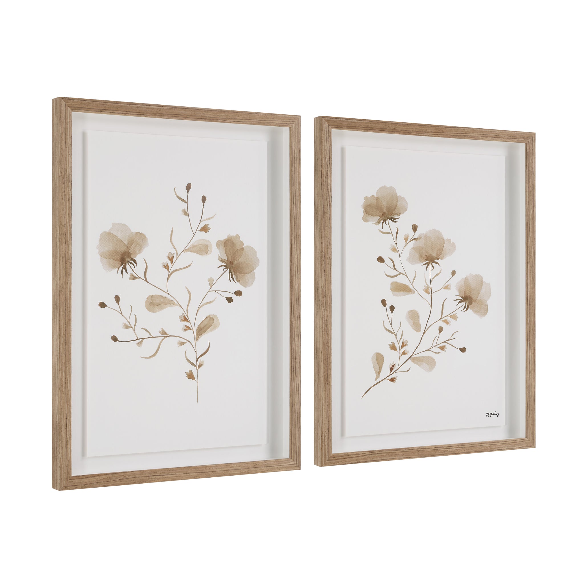 Madalena wall art showcasing two floral designs in soft beige with light wood frames.