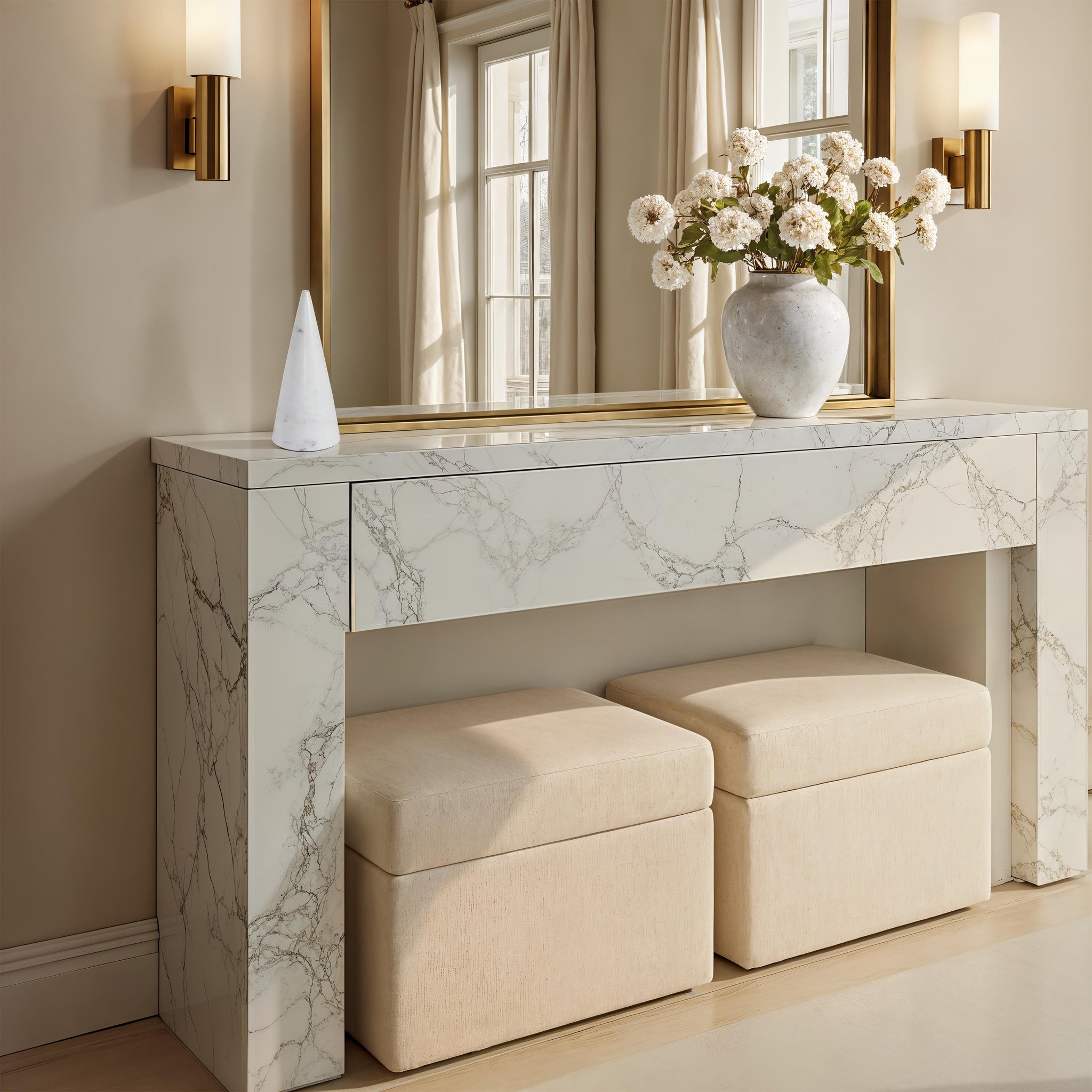 Silica statue by Renwil displayed on a marble console table with a vase.