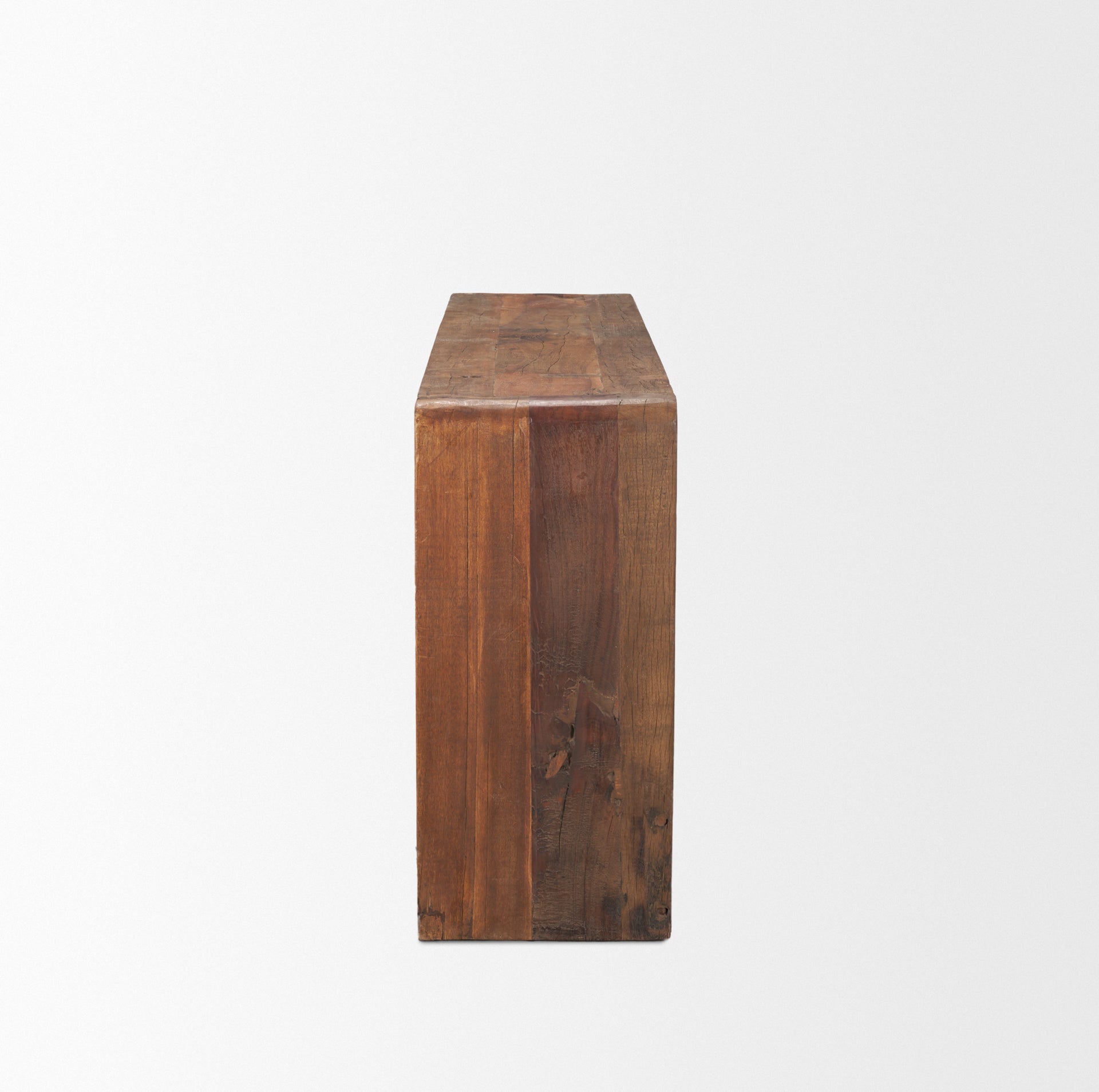 Estelle Rustic Brown Reclaimed Wood Console Table shown from a different angle to reveal its silhouette.