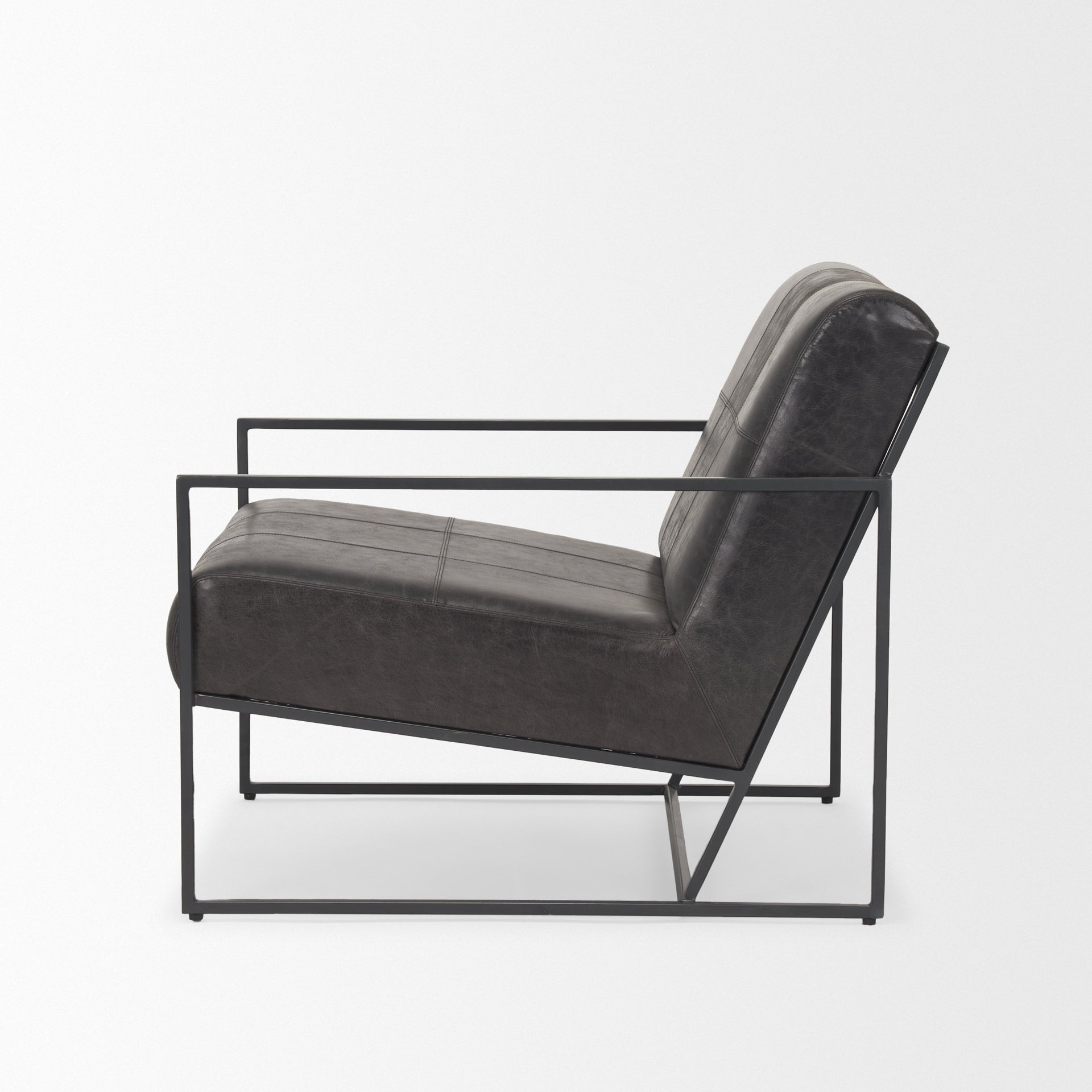 Stratton Gunmetal w/ Genuine Aged Black Leather Upholstered Accent Chair shown from a different angle to reveal its silhouette.