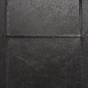 Stratton Gunmetal w/ Genuine Aged Black Leather Upholstered Accent Chair viewed from the side.