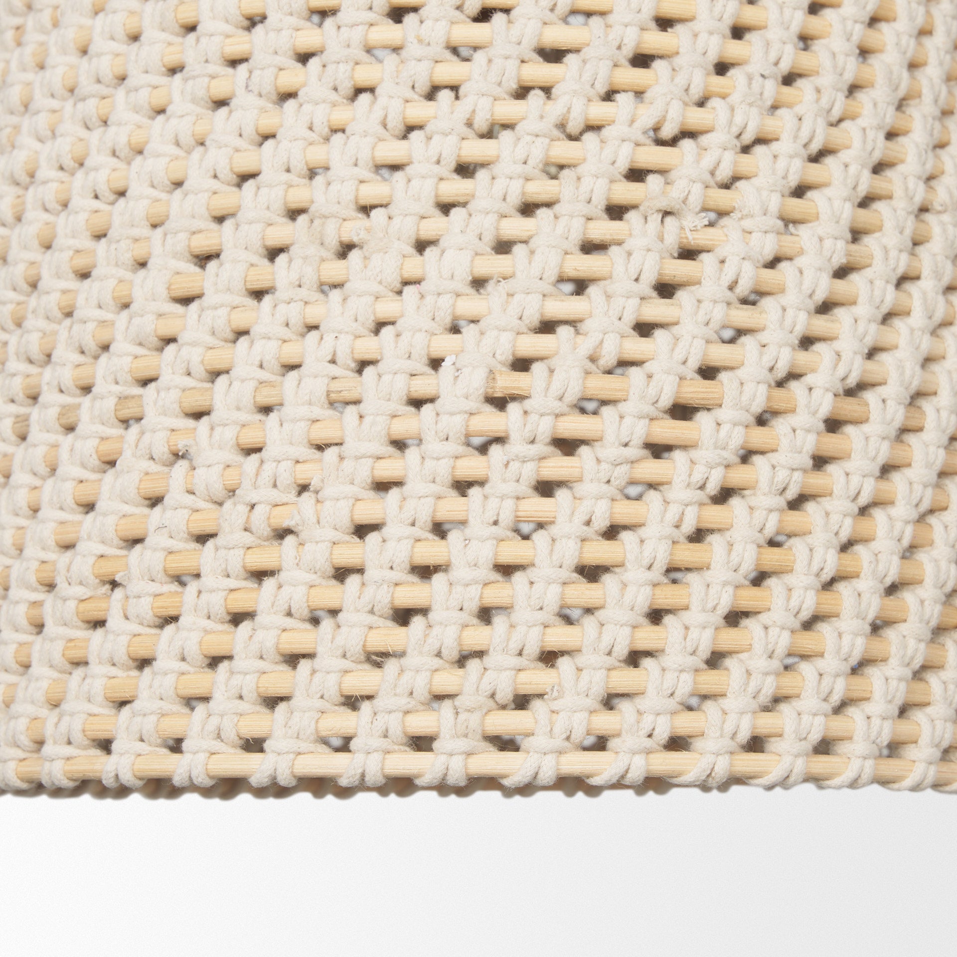 Tosha 1-Light Cotton Rope Bell Pendant shown from a different angle to reveal its silhouette.