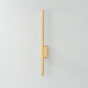Bernard Wall Sconce in aged brass shown from the front to reveal the arm curve and shade silhouette.