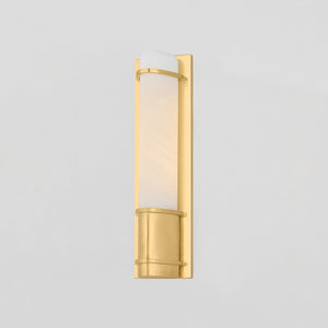 Close-up of the Tottenville Wall Sconce 4.25" x 16.25" in aged brass showing the arm curve and shade silhouette.