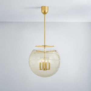 Gill Pendant 19.5" in aged brass shown from the front to reveal the shade shape and metal detail.