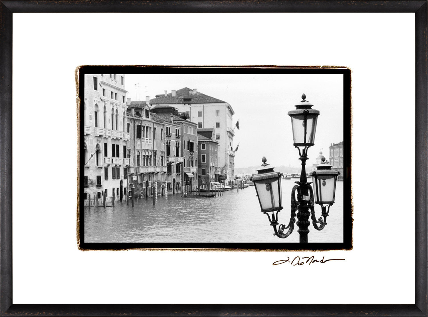 Waterways Of Venice XI wall art featuring a black and white photo of Venetian buildings and street lamps.