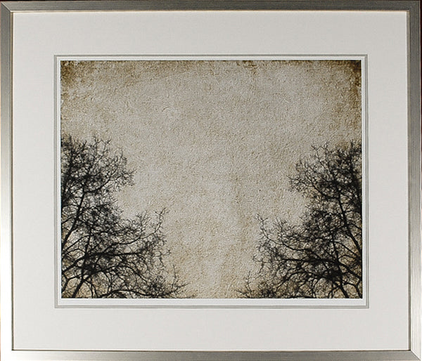 Through The Trees I wall art featuring dark tree silhouettes against a textured beige background