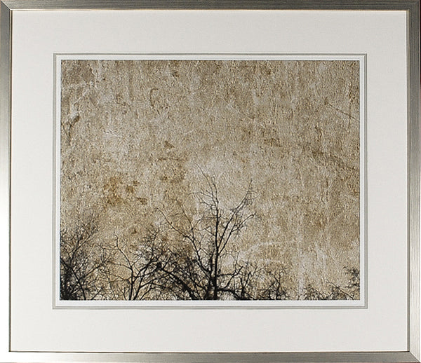 Through The Trees II wall art featuring a textured beige background with dark tree silhouettes.