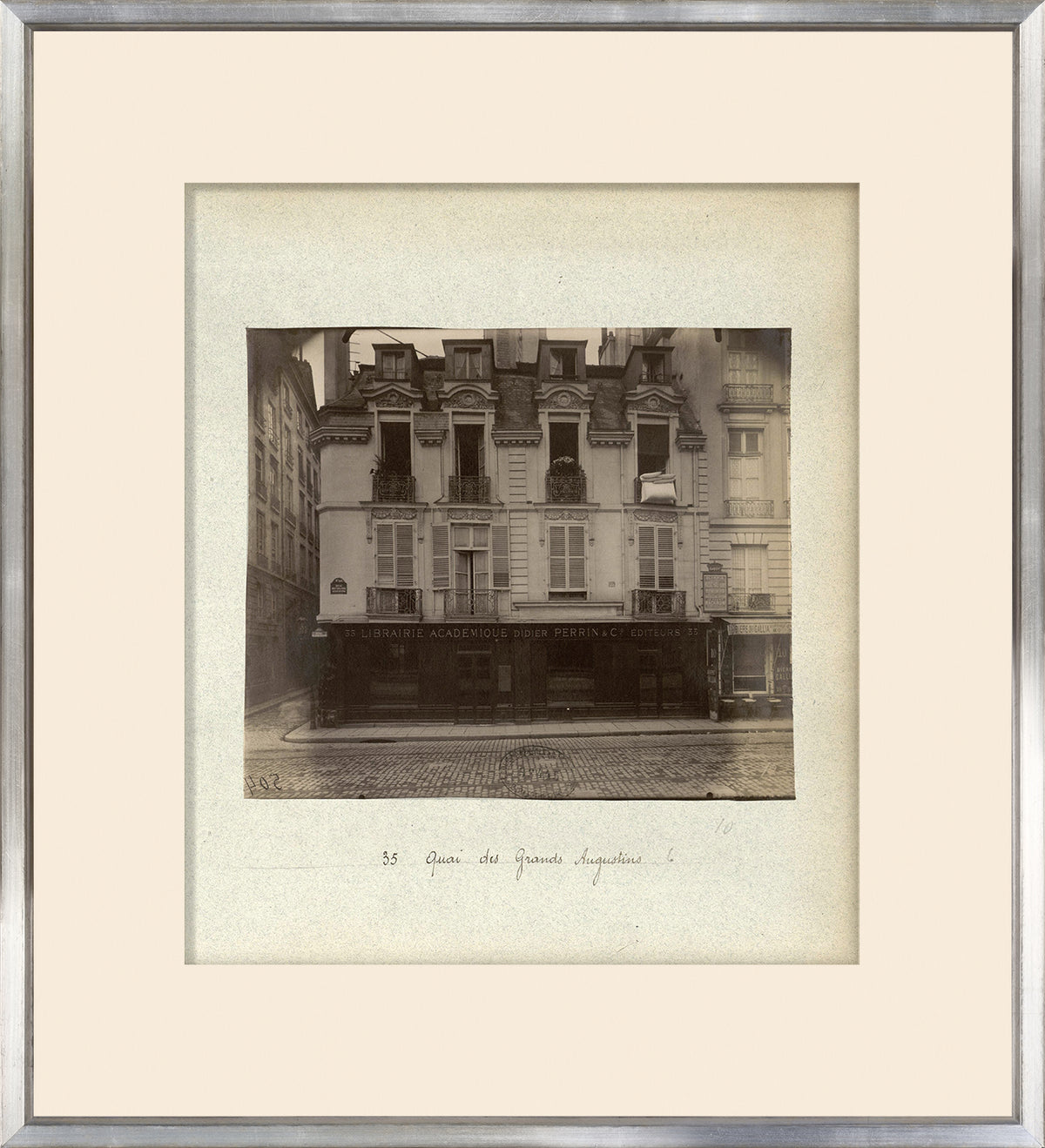 Rue De Paris-35 Quai Des Grands Augustins wall art featuring a vintage black and white photo of a Parisian building.