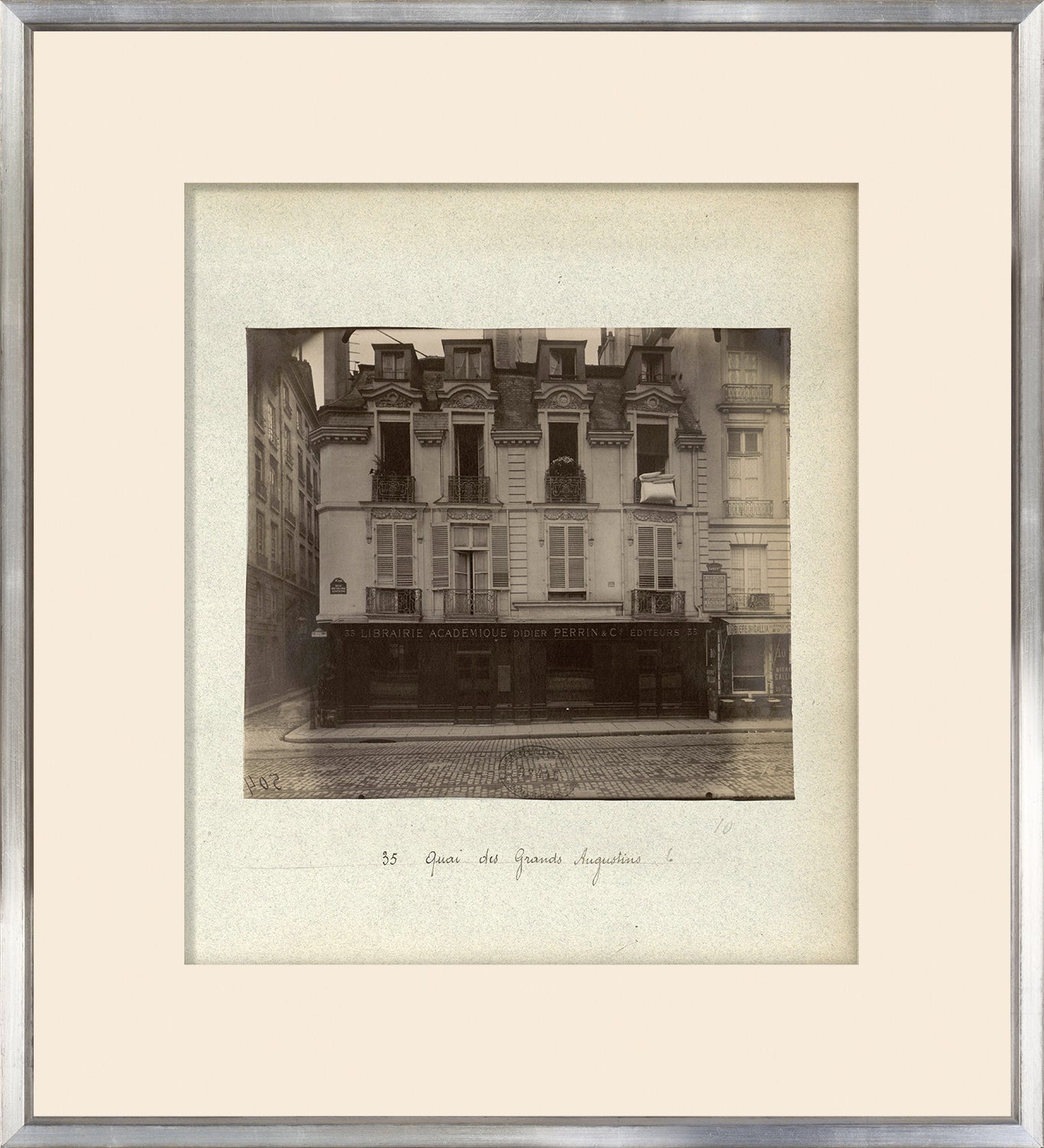 Rue De Paris-35 Quai Des Grands Augustins wall art featuring a vintage black and white photo of a Parisian building.