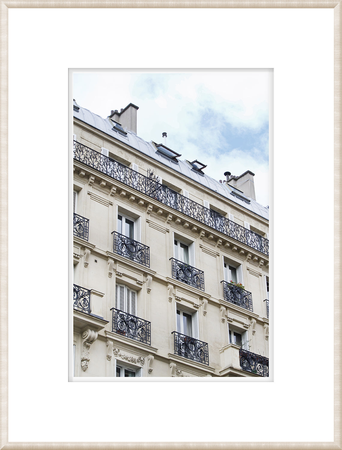 Parisian – Balcony Detail wall art featuring ornate black iron railings on a cream-colored building.